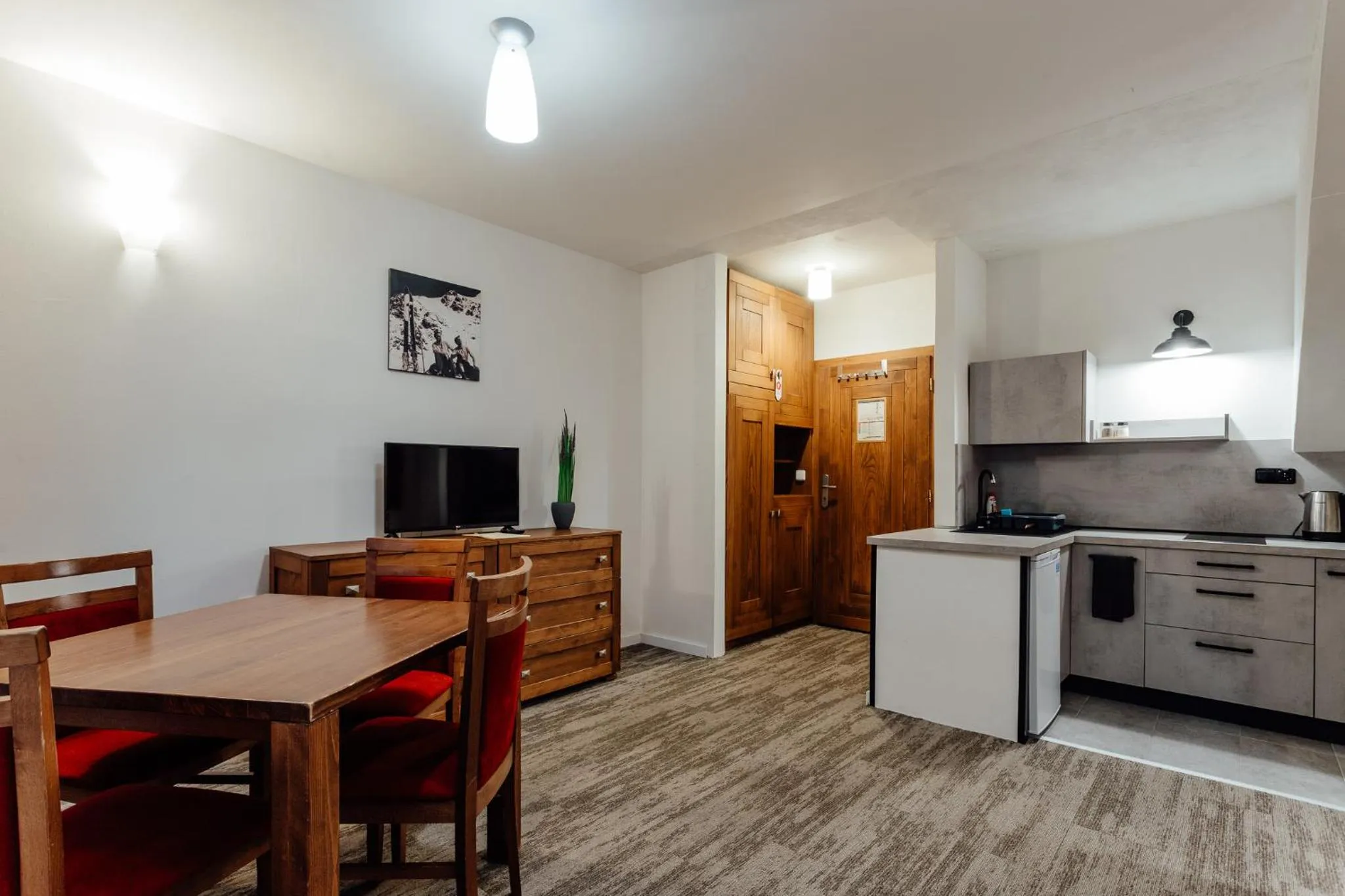 Communal lounge/ TV room in Hotel Mikulášska Chata