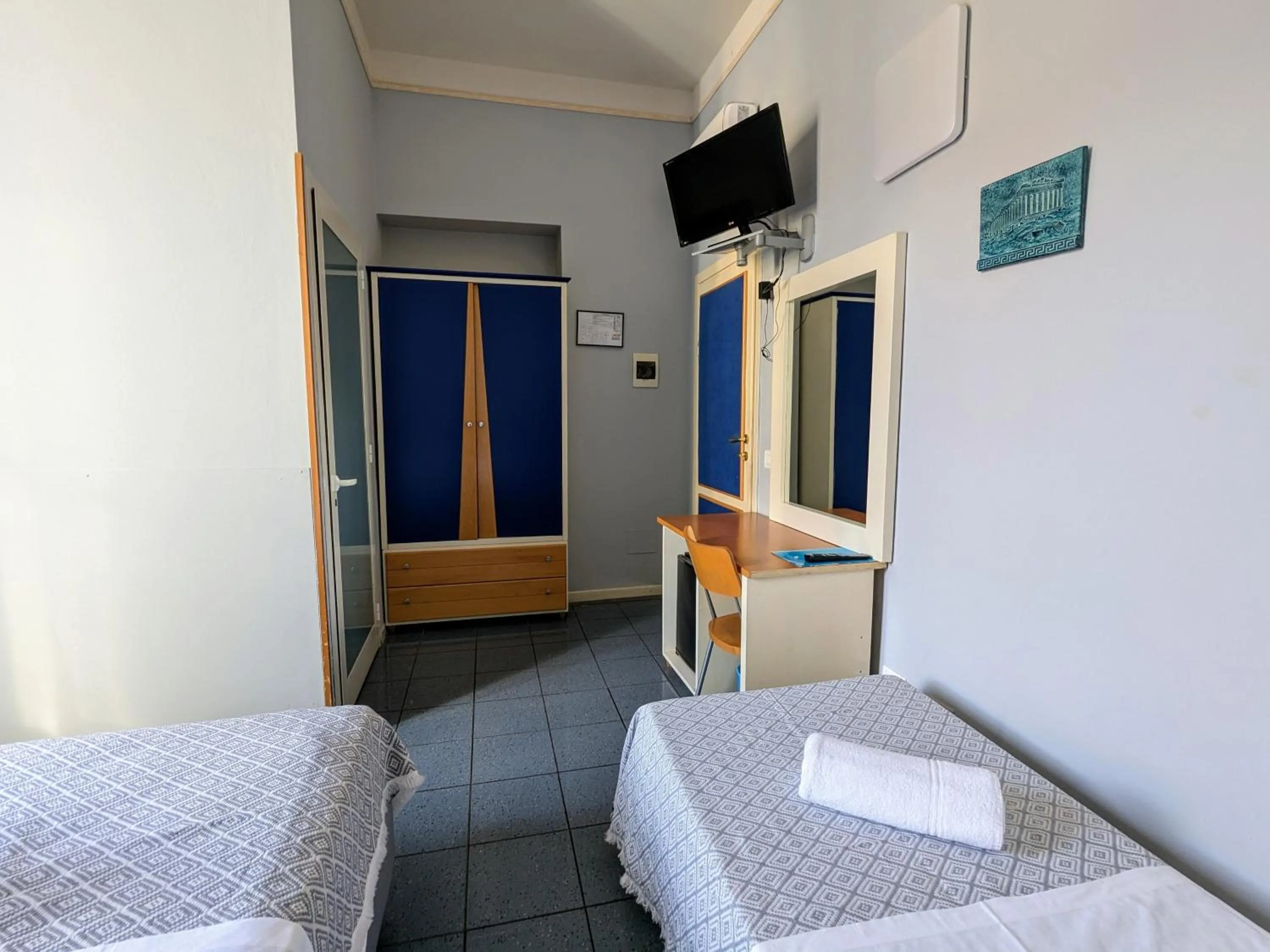 Bed in Hotel Soggiorno Athena