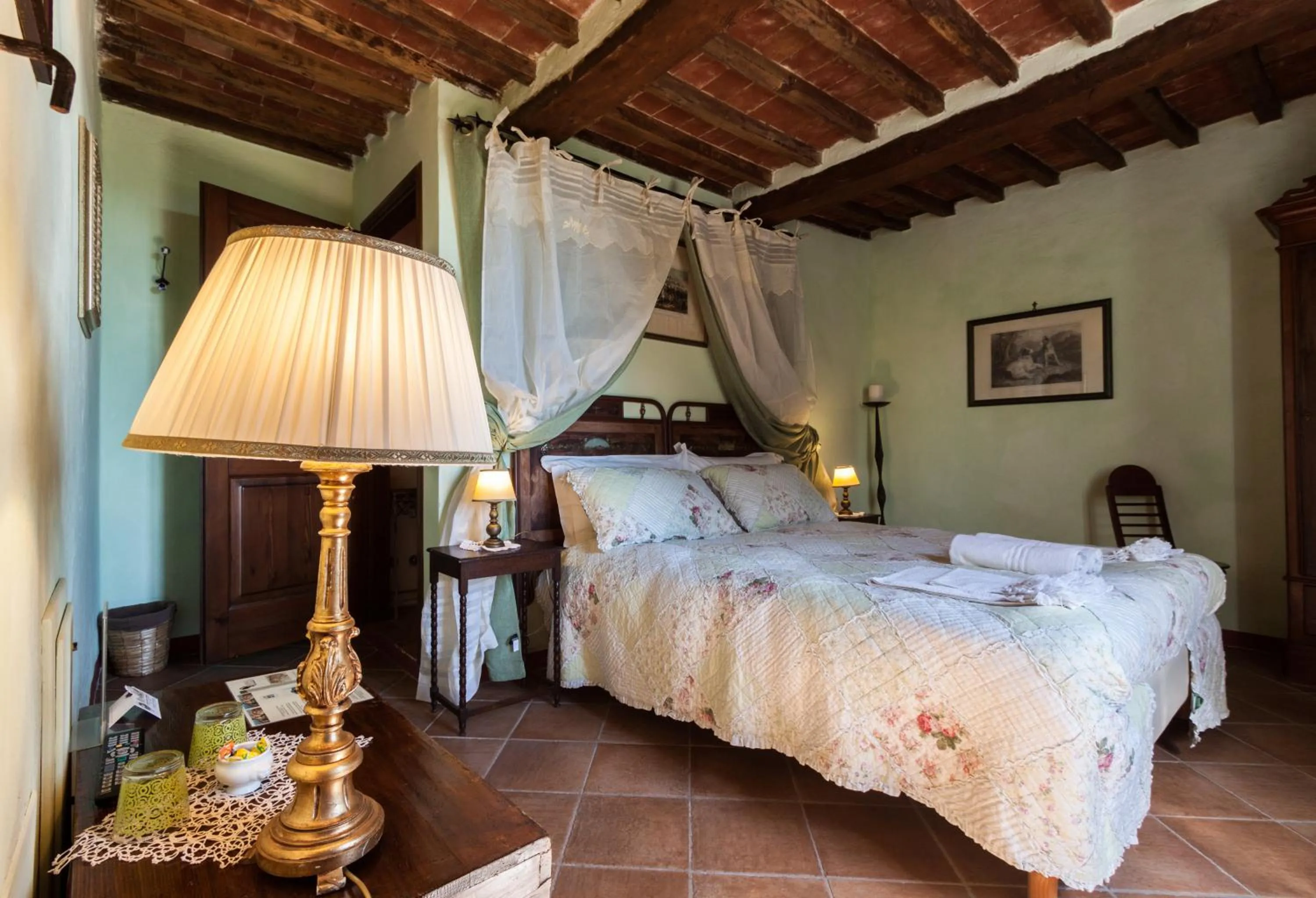 Bed in Borgo Tepolini Country House