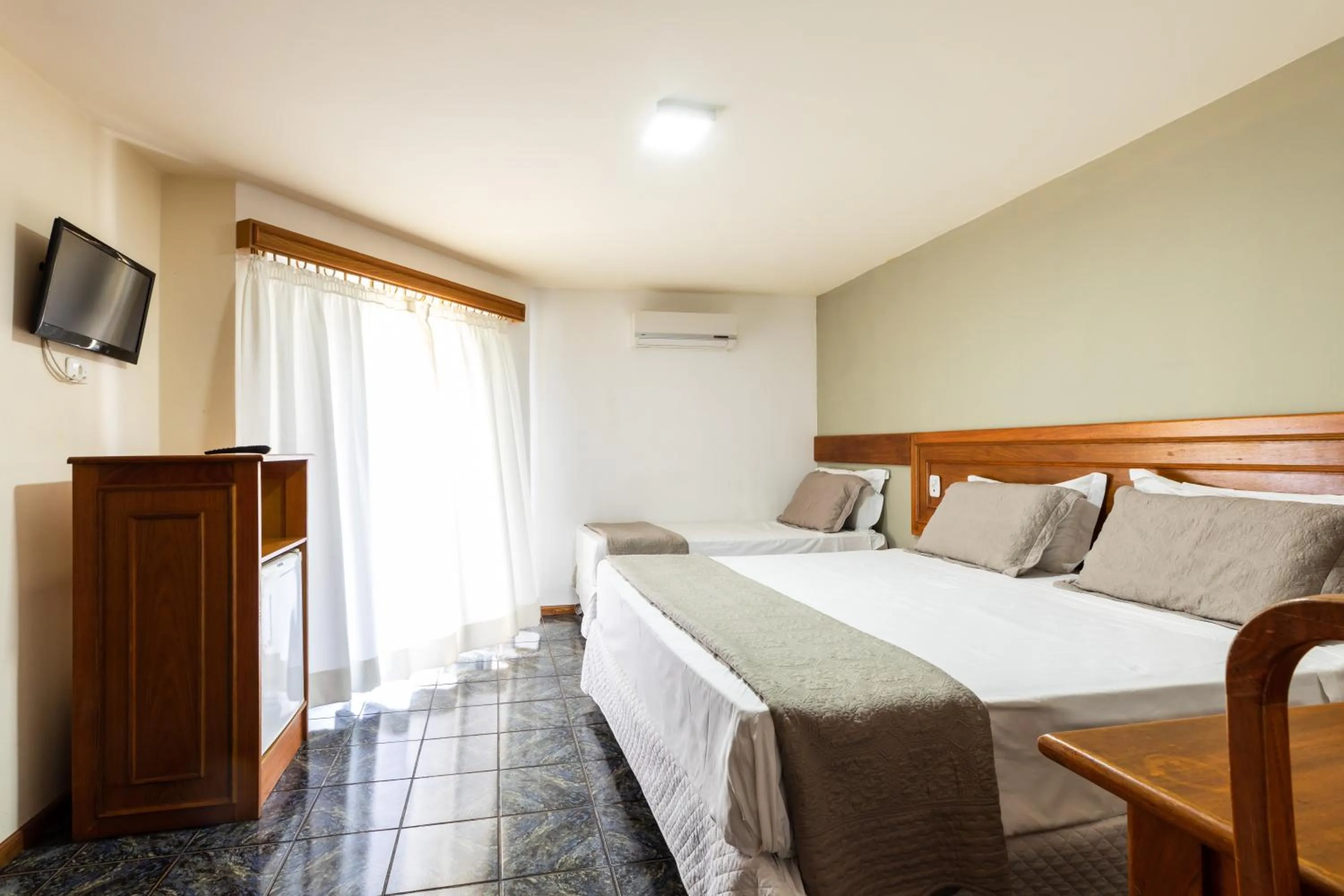 Bed in Canzi Cataratas Hotel