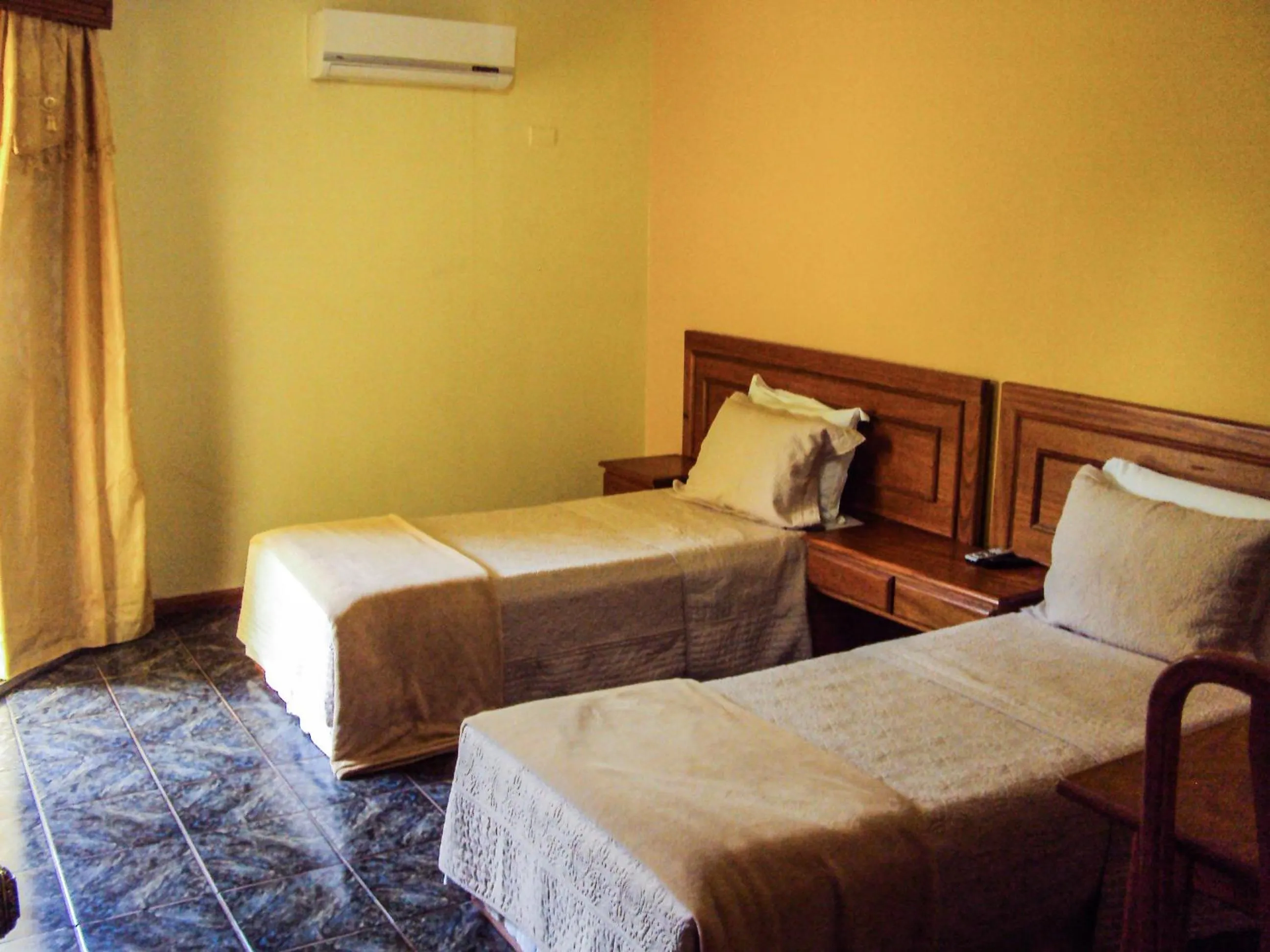 Bed in Canzi Cataratas Hotel