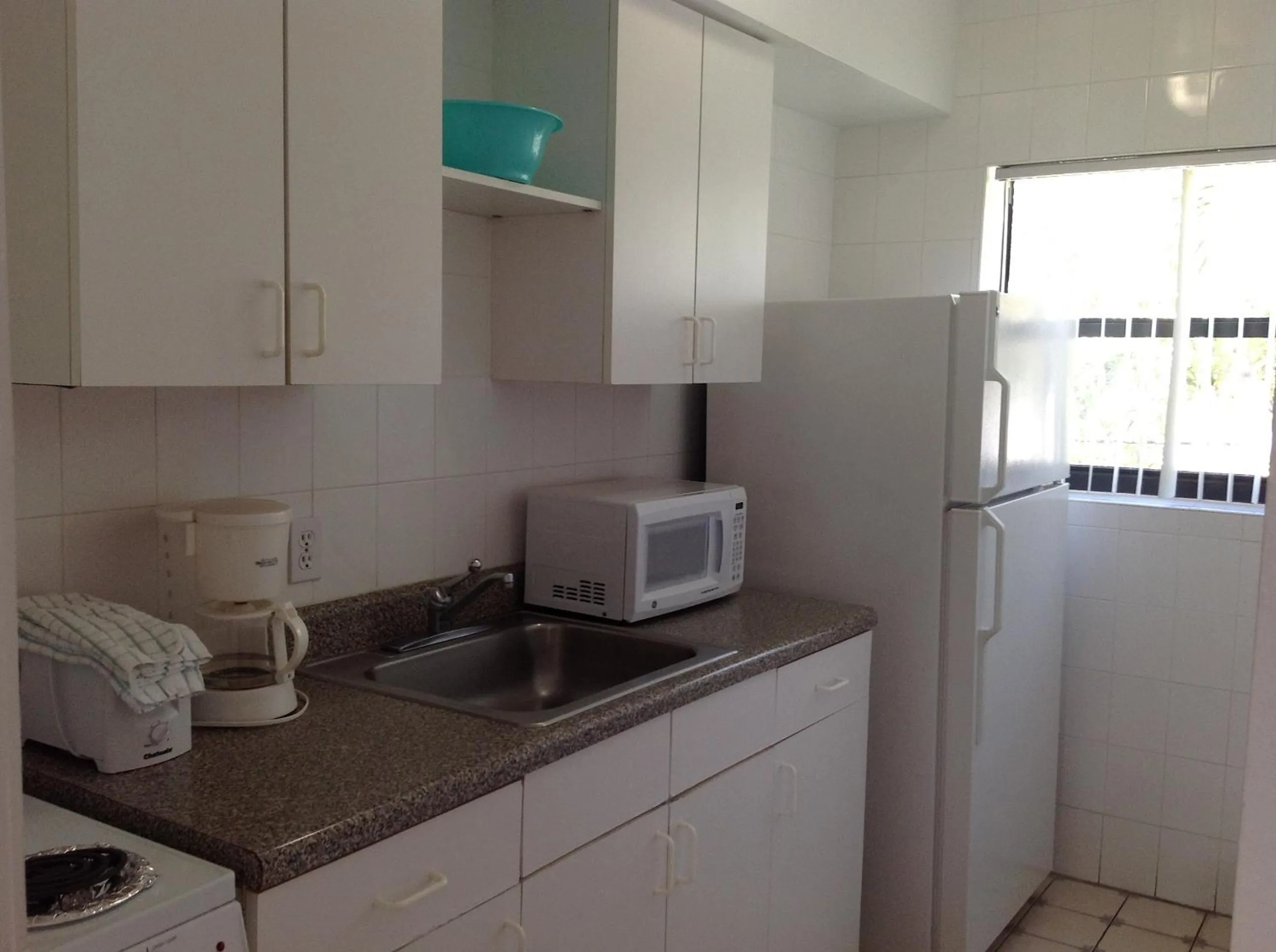 Kitchen or kitchenette in Napoli Belmar Resort
