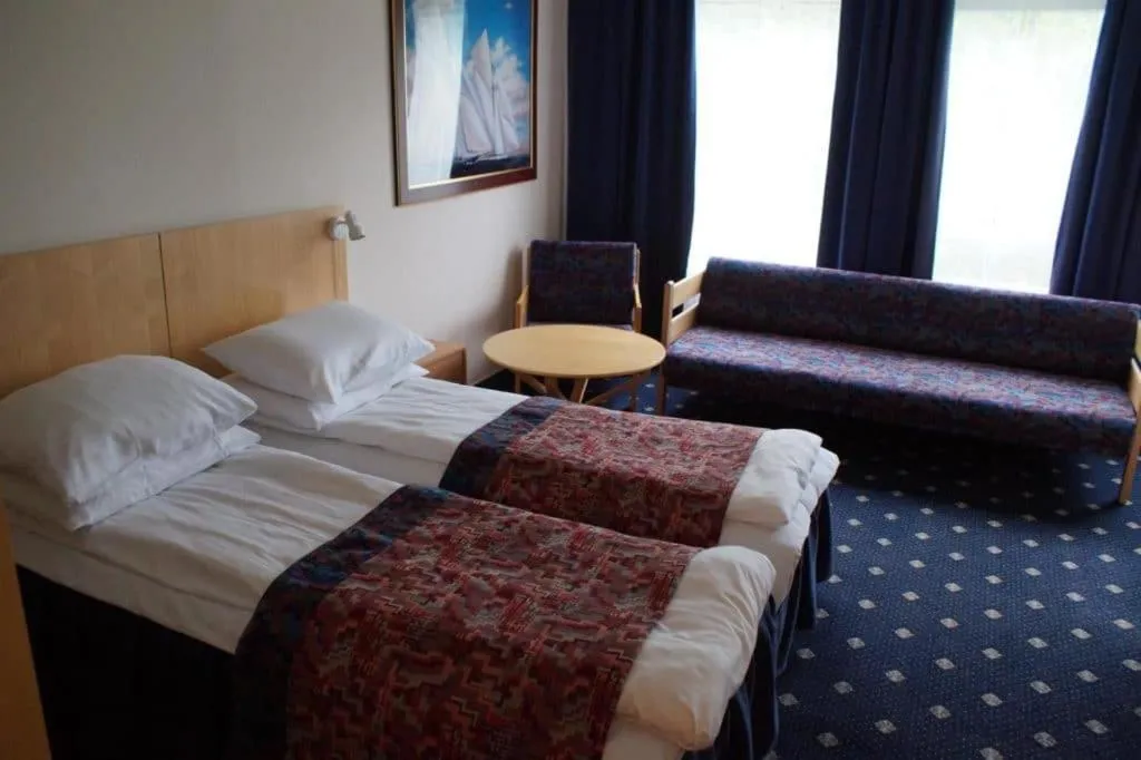 Photo of the whole room, Bed in Welcome Inn Hotel Lyngskroa
