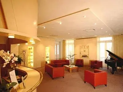 Lobby or reception in Logis Grand Hôtel Des Bains Lobby or reception in Logis Grand Hôtel Des Bains