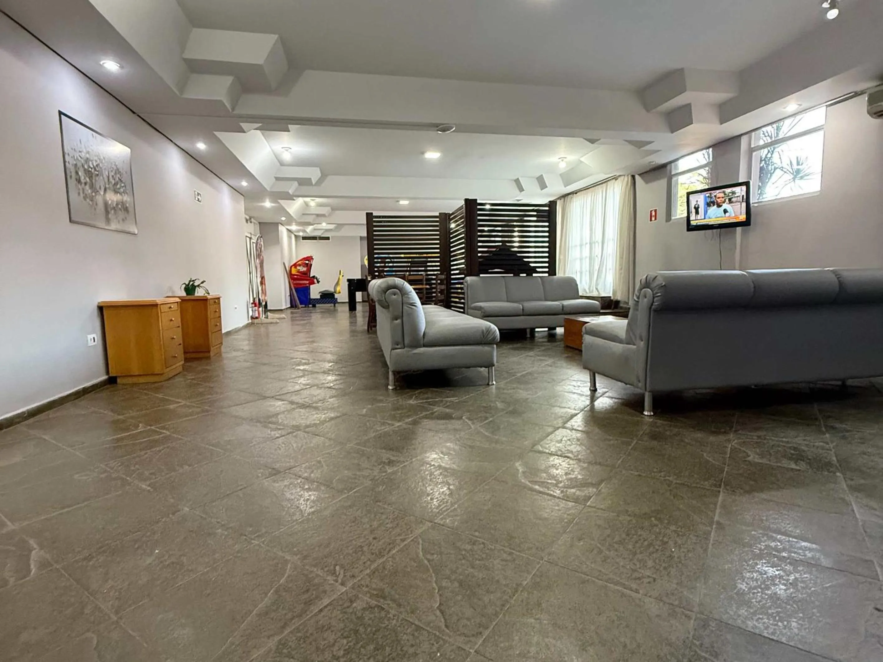 Communal lounge/ TV room in Manacá Hotel