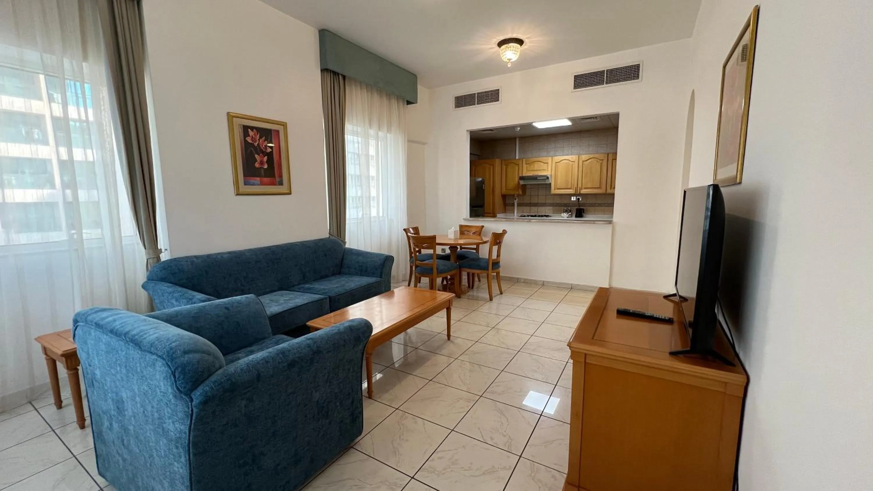 Living room in Uptown Hotel Apartments Abu Dhabi by Gewan