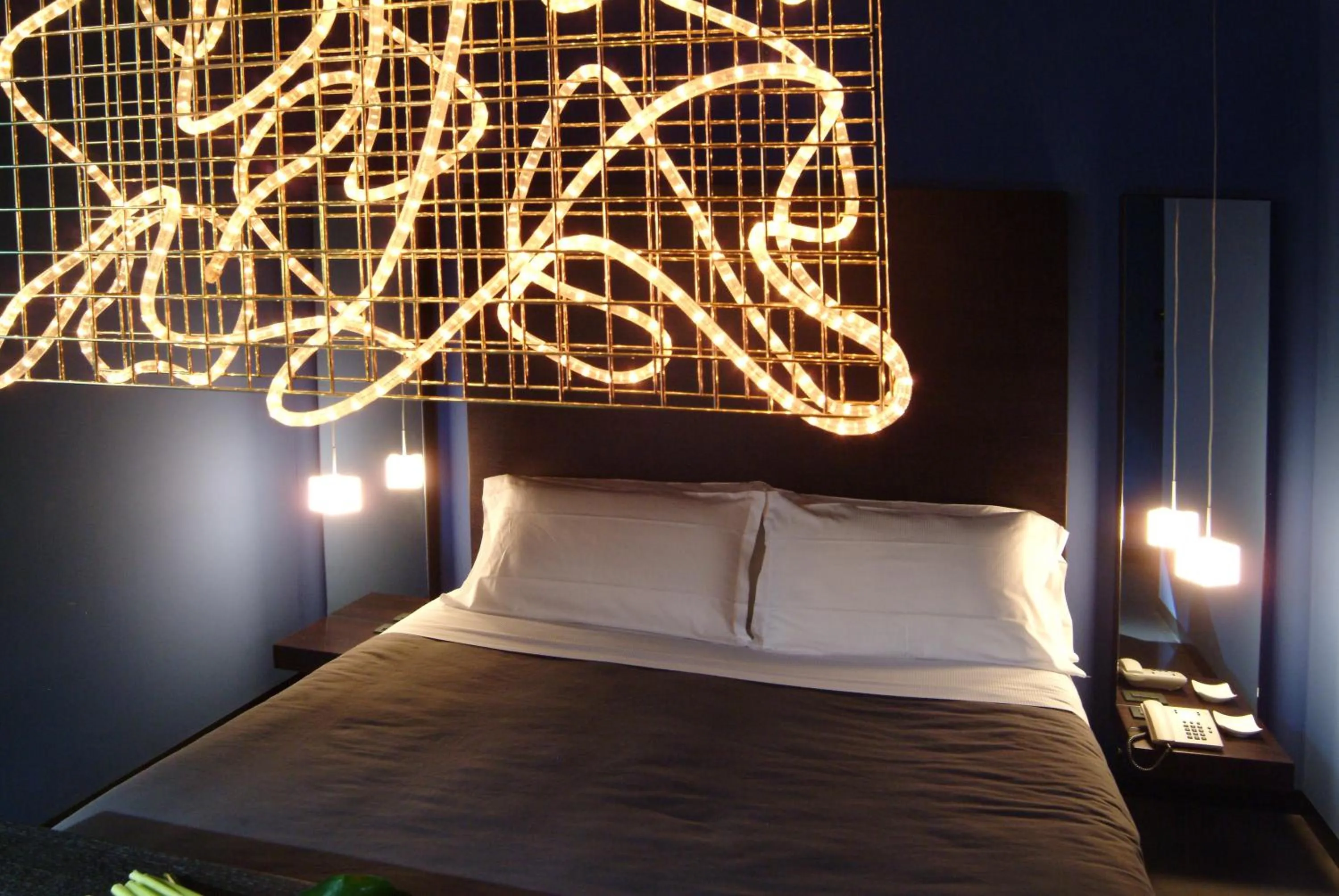 Decorative detail, Bed in Hotel Clocchiatti Next