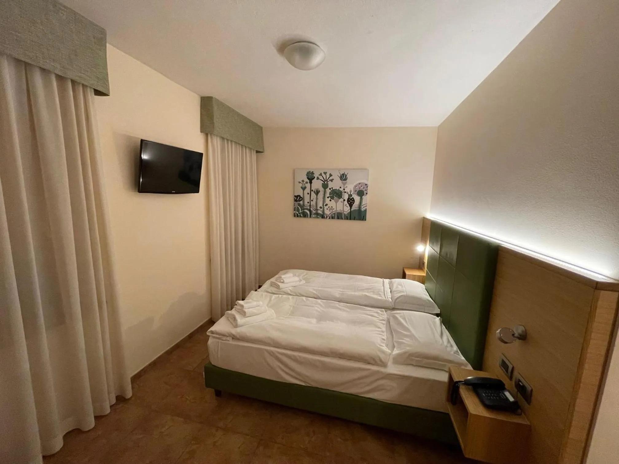 Bed in Hotel Trieste