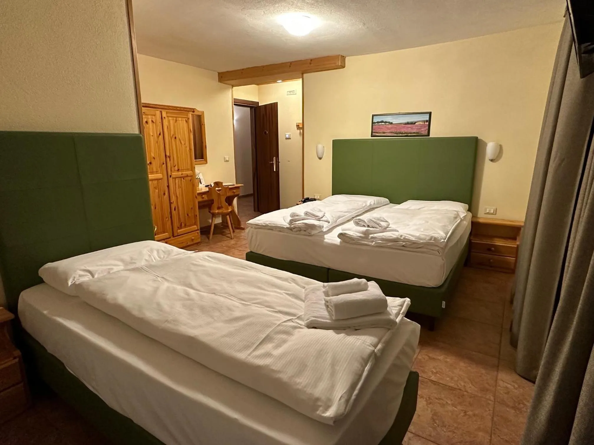 Bed in Hotel Trieste