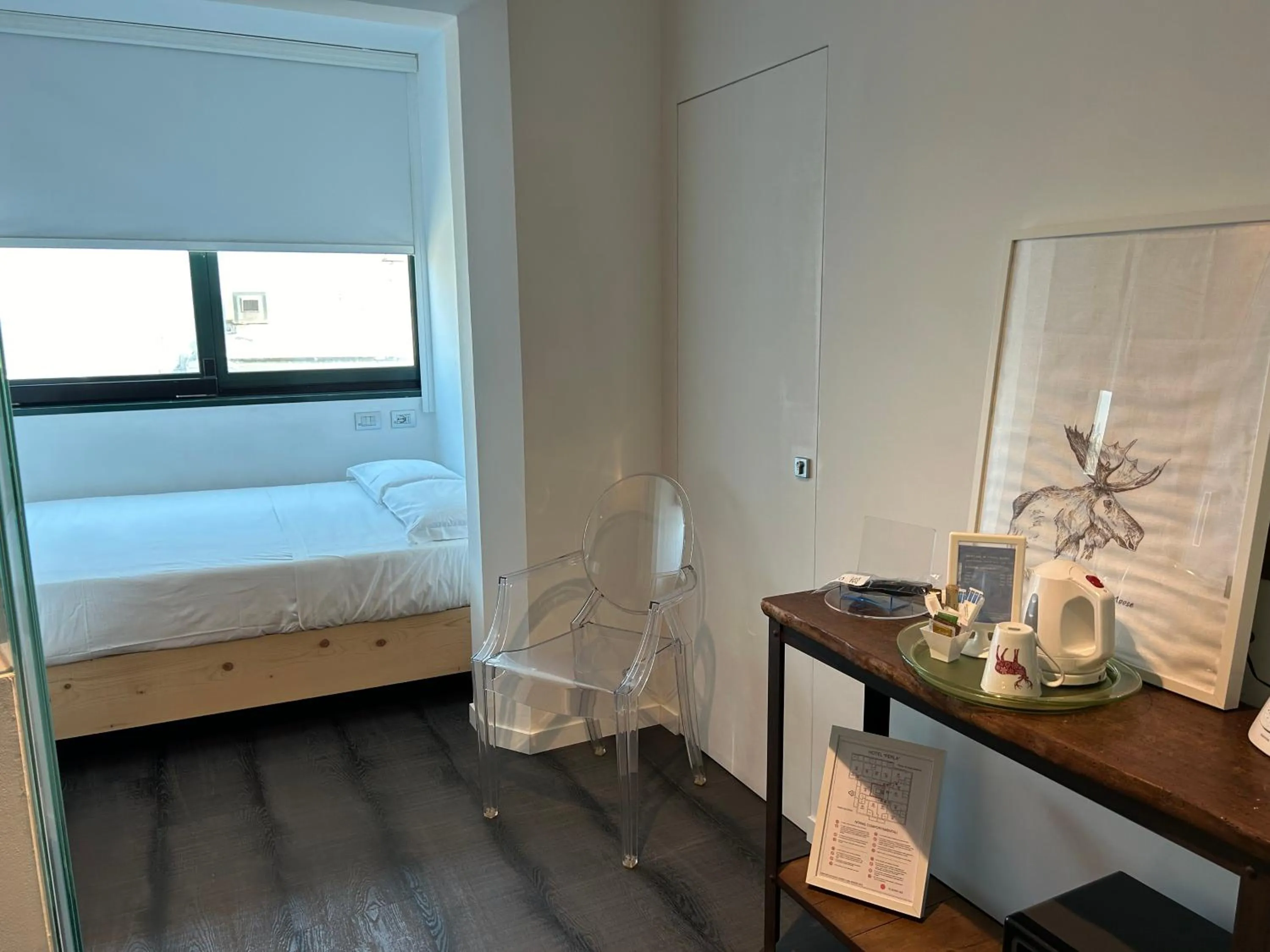 Bed in Hotel Perla - The storyhoteller