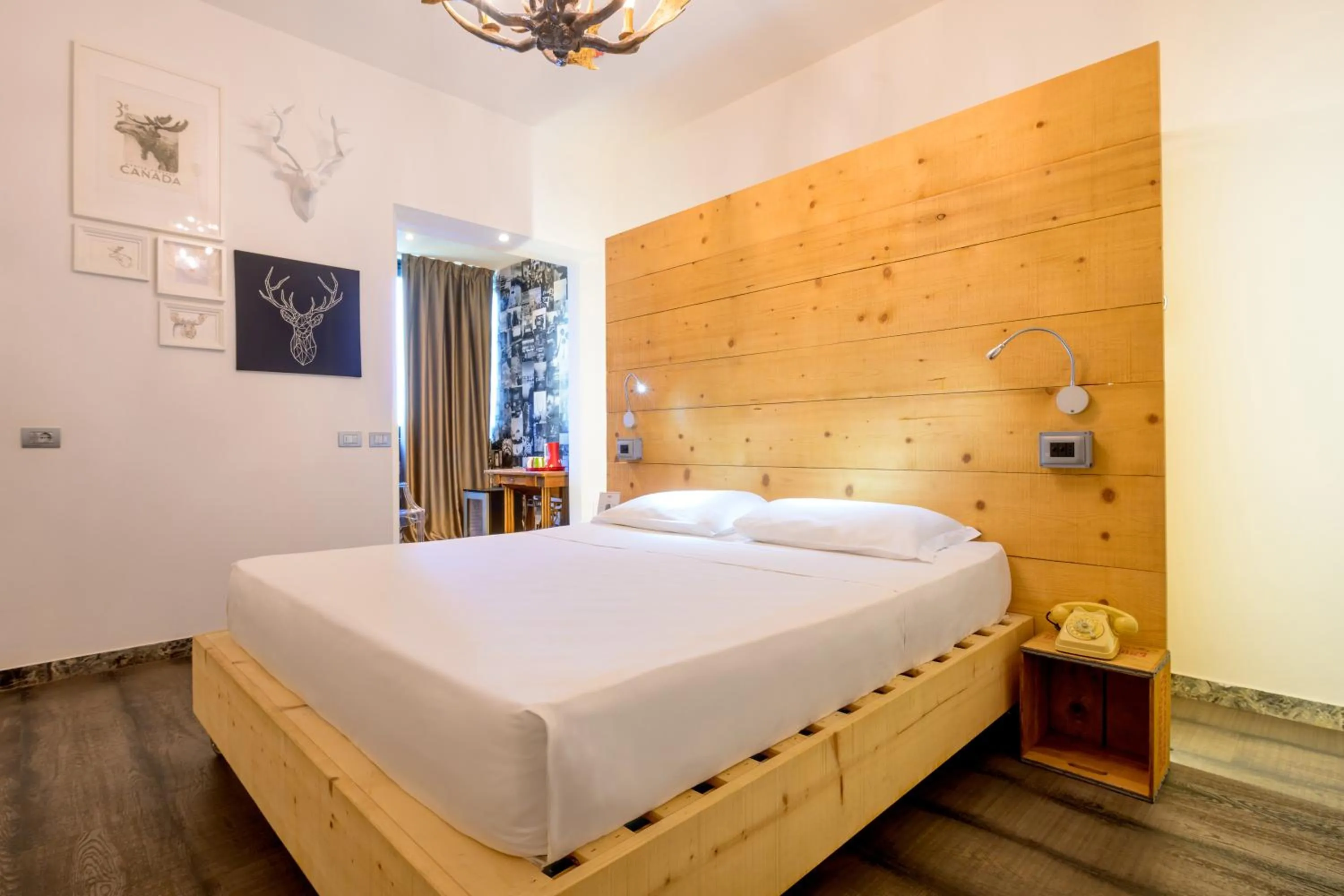 Bed in Hotel Perla - The storyhoteller