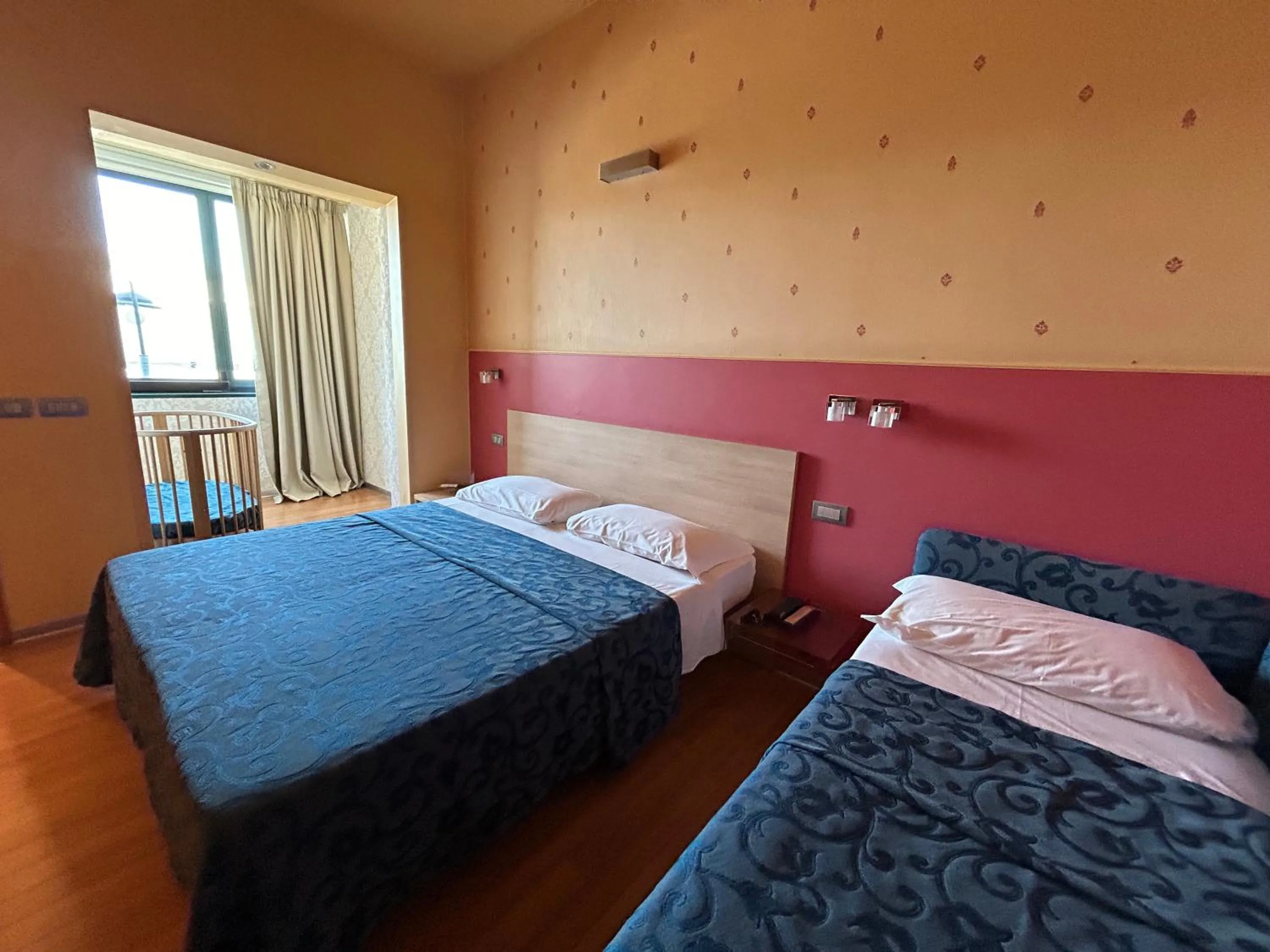 Bed in Hotel Perla - The storyhoteller