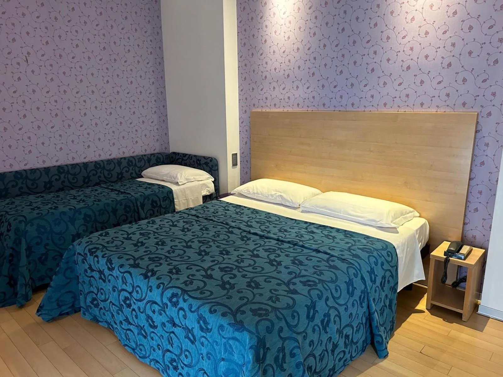 Bedroom in Hotel Perla - The storyhoteller