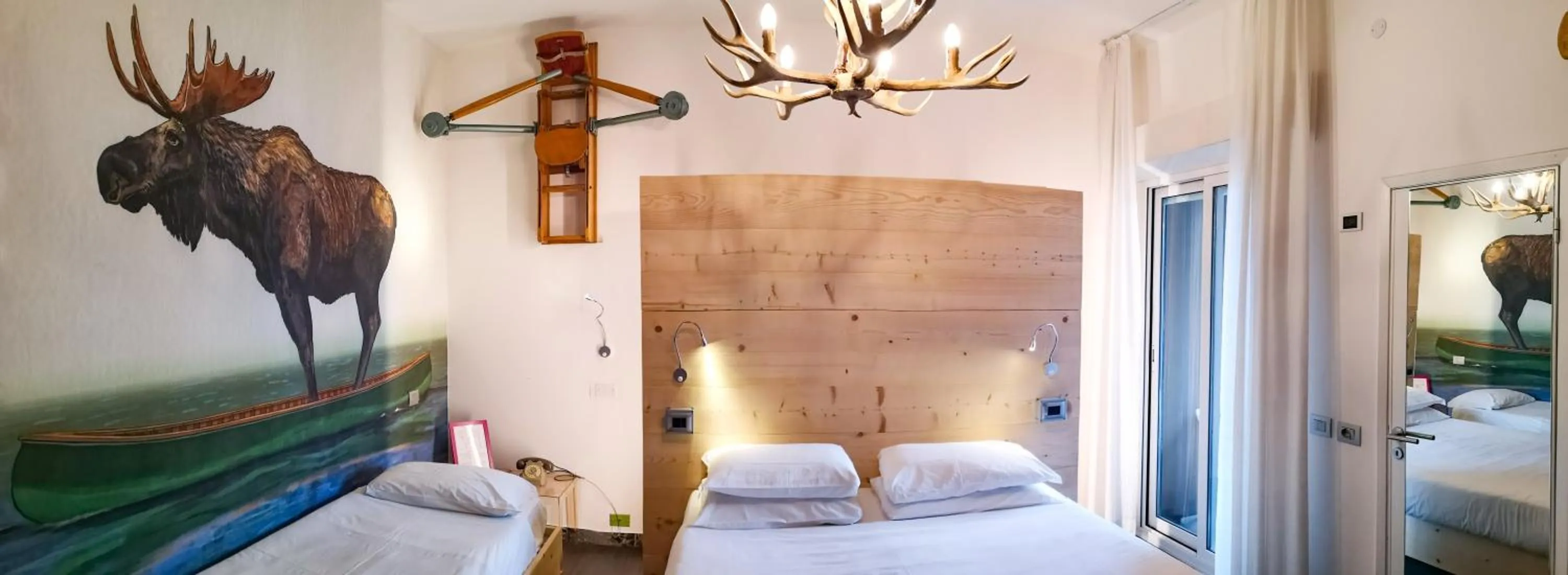 Bed in Hotel Perla - The storyhoteller