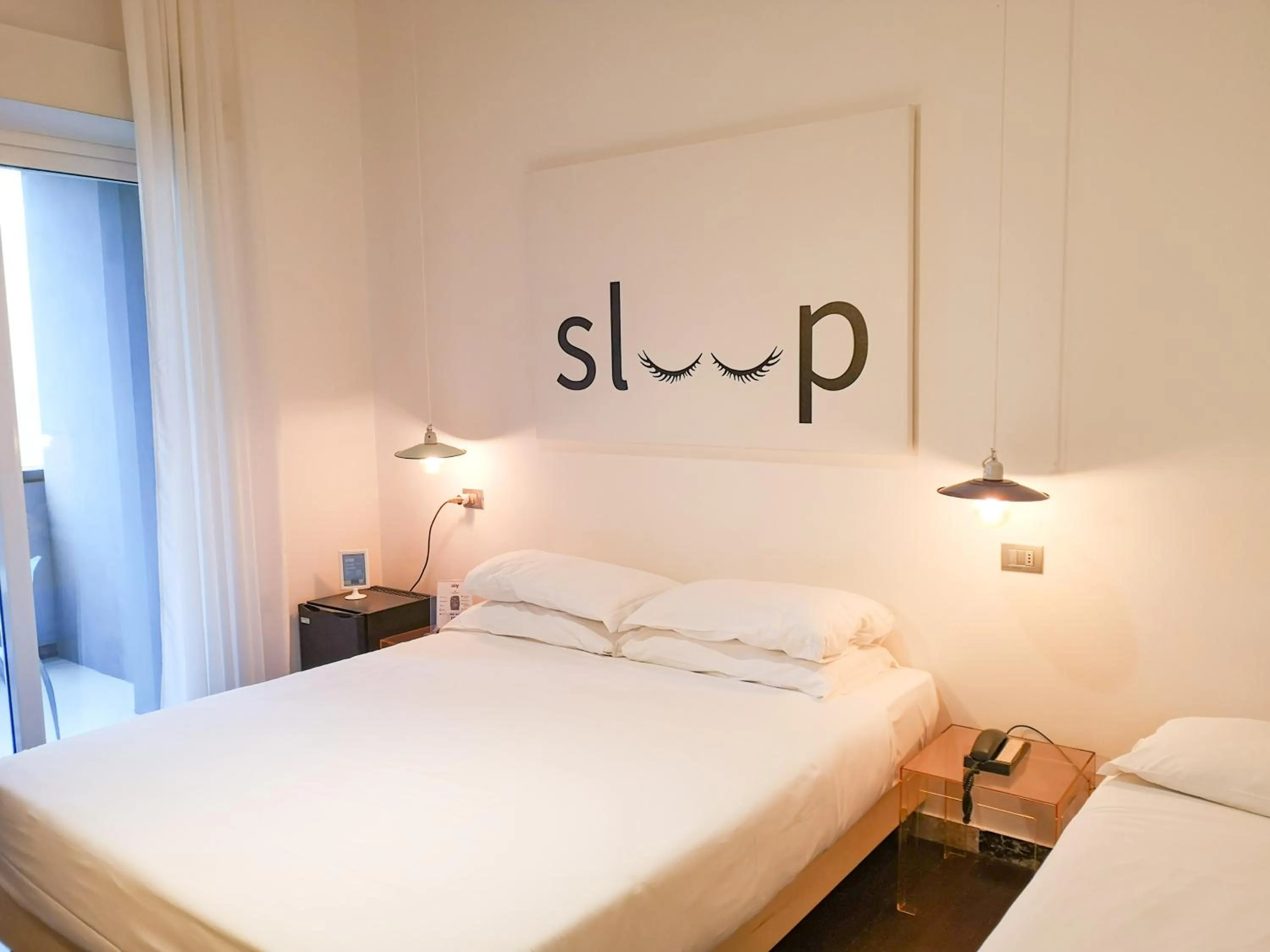 Bed in Hotel Perla - The storyhoteller