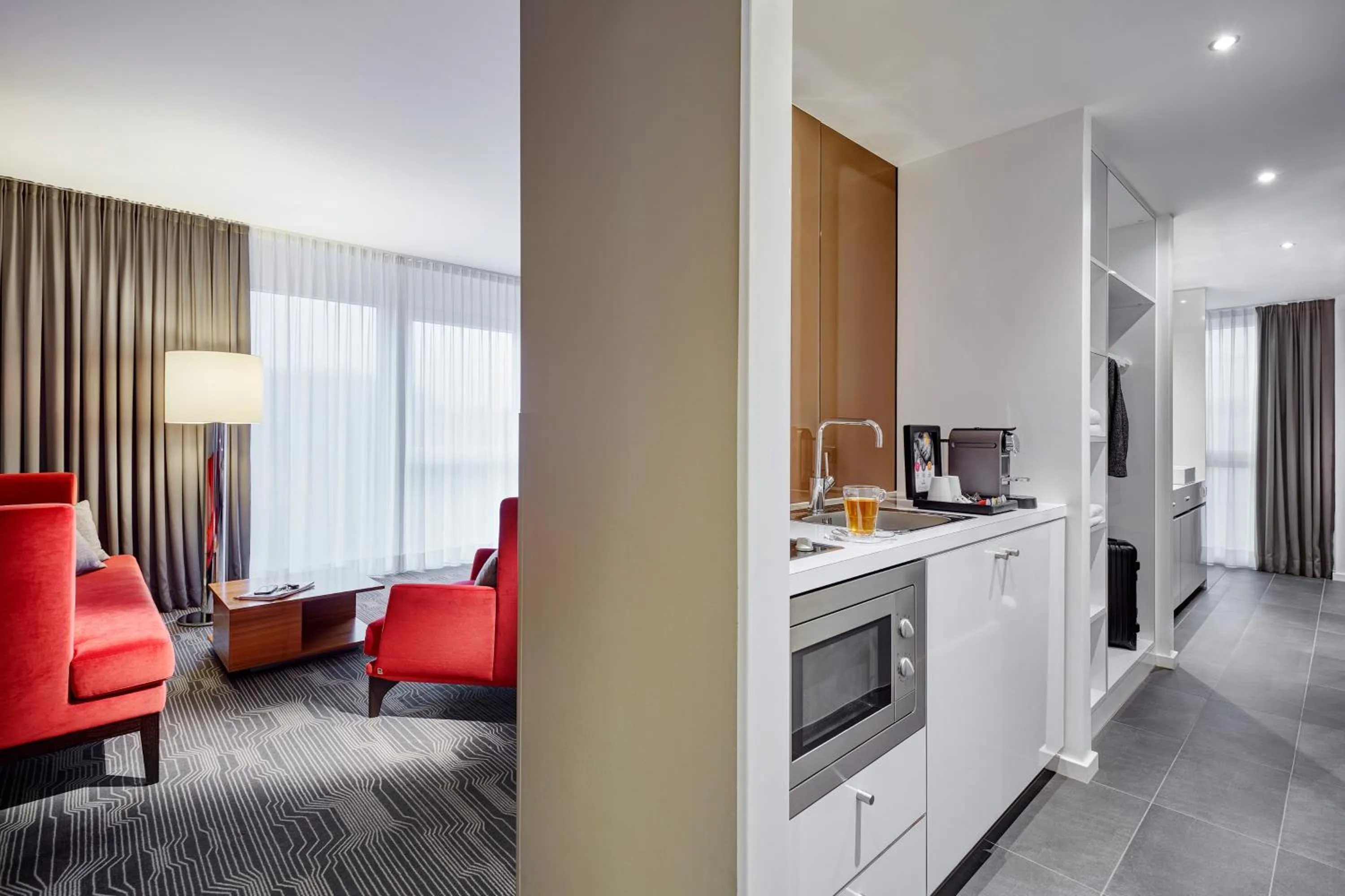 Kitchen or kitchenette in LEGERE HOTEL Luxembourg
