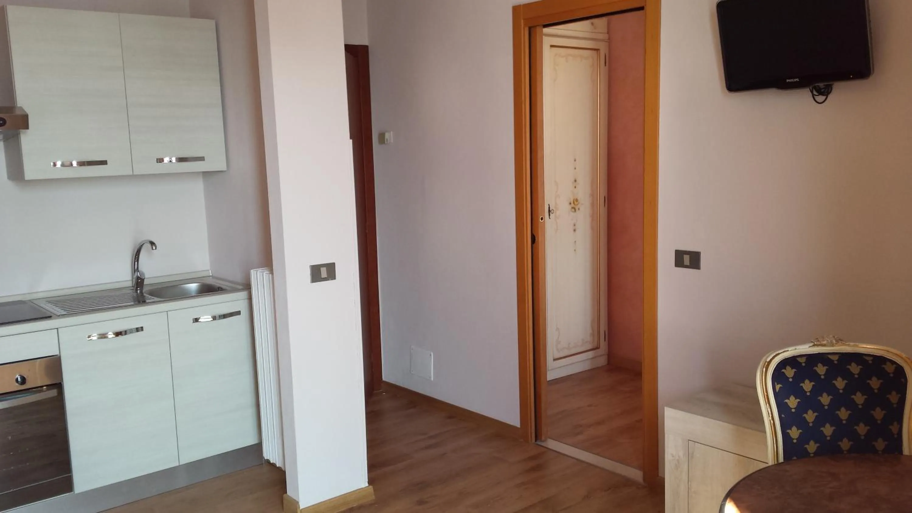 Kitchen or kitchenette in Garda Sol SPA Hotel & Appartamenti