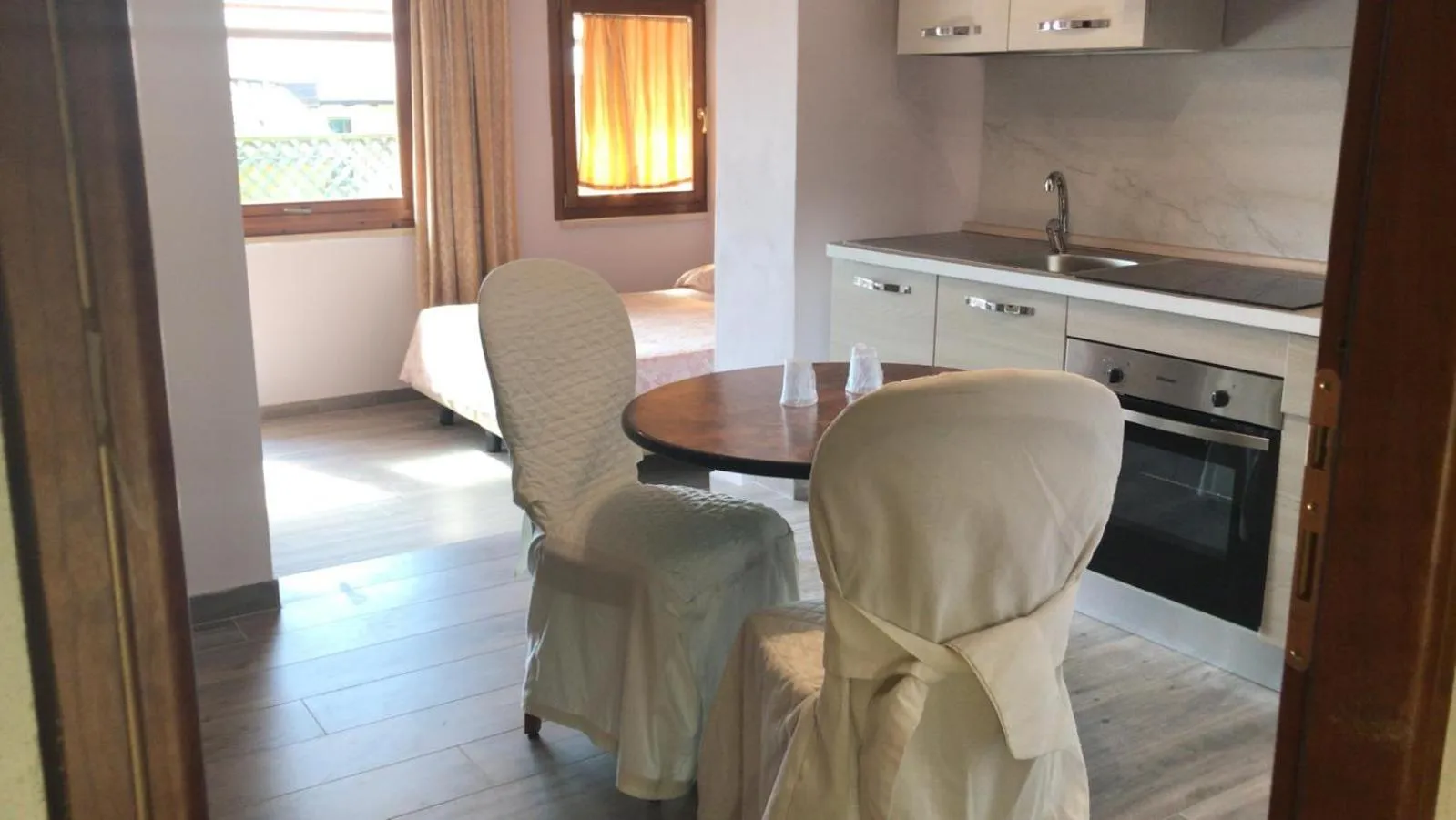 Kitchen or kitchenette in Garda Sol SPA Hotel & Appartamenti