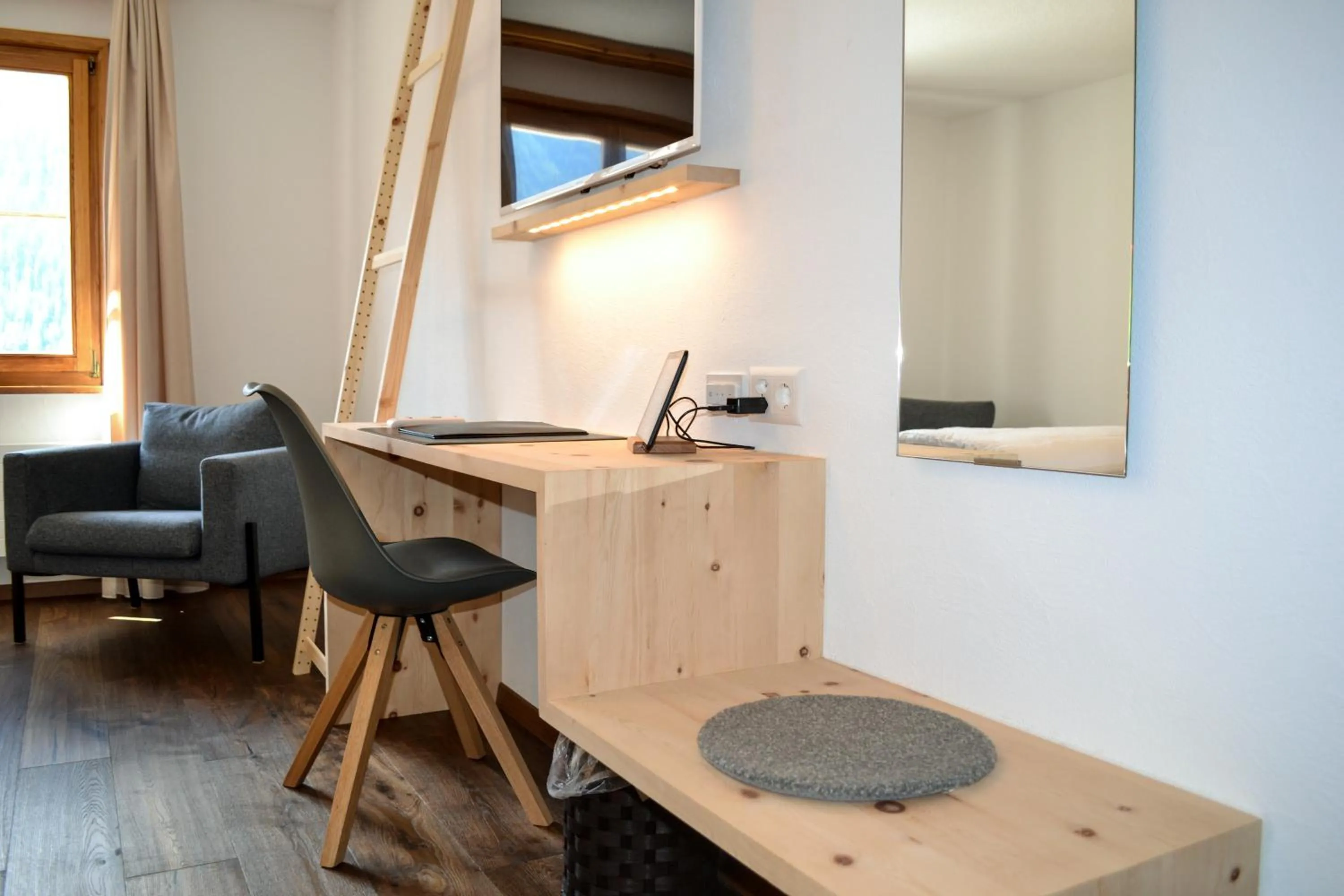 Photo of the whole room in Schorta's Alvetern - Boutique Hotel