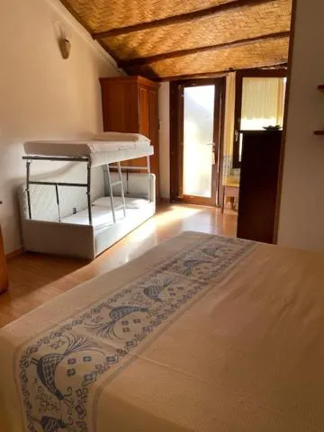 Bed in Hotel Villa Canu