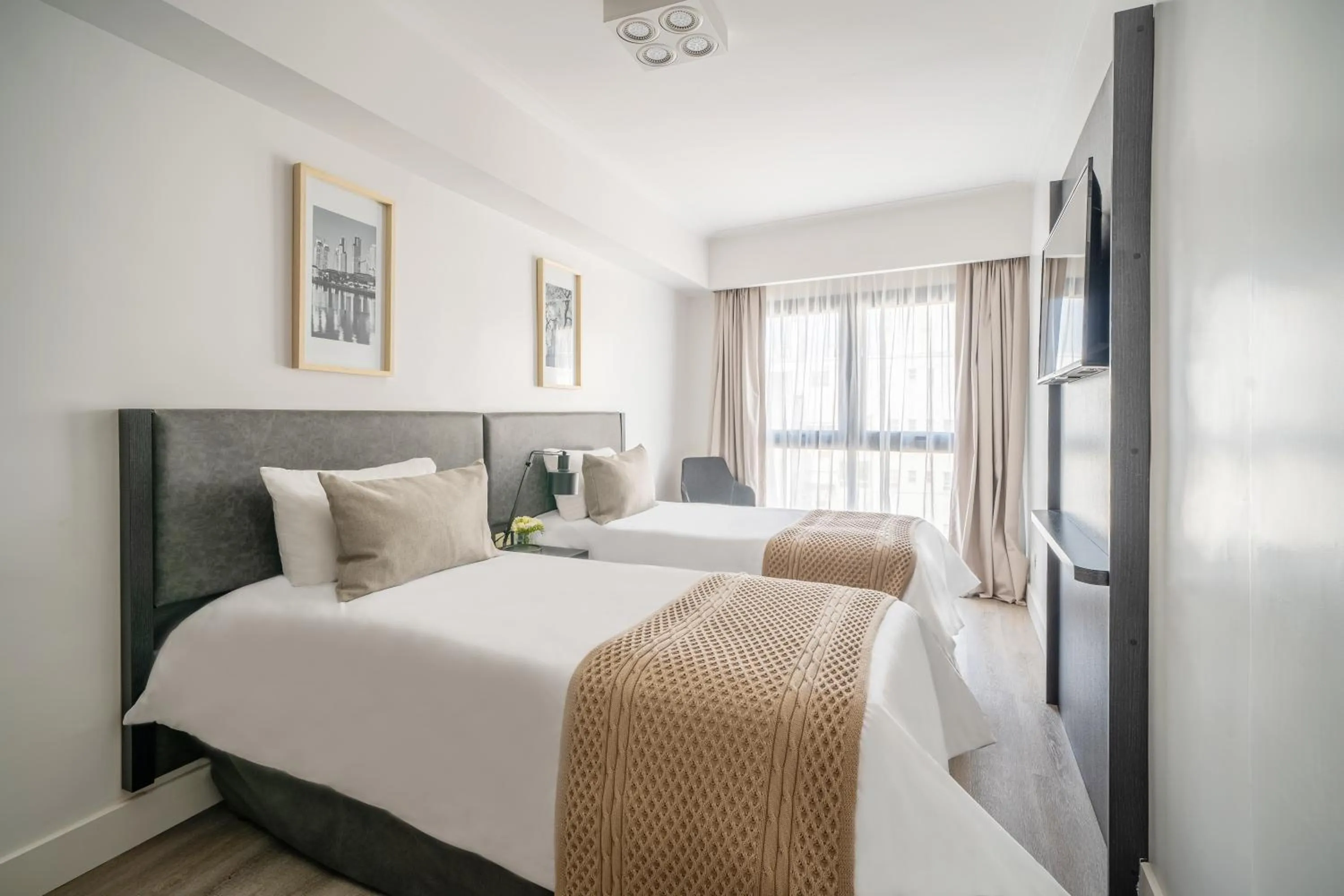 Bed in Efe Hotel & Cowork