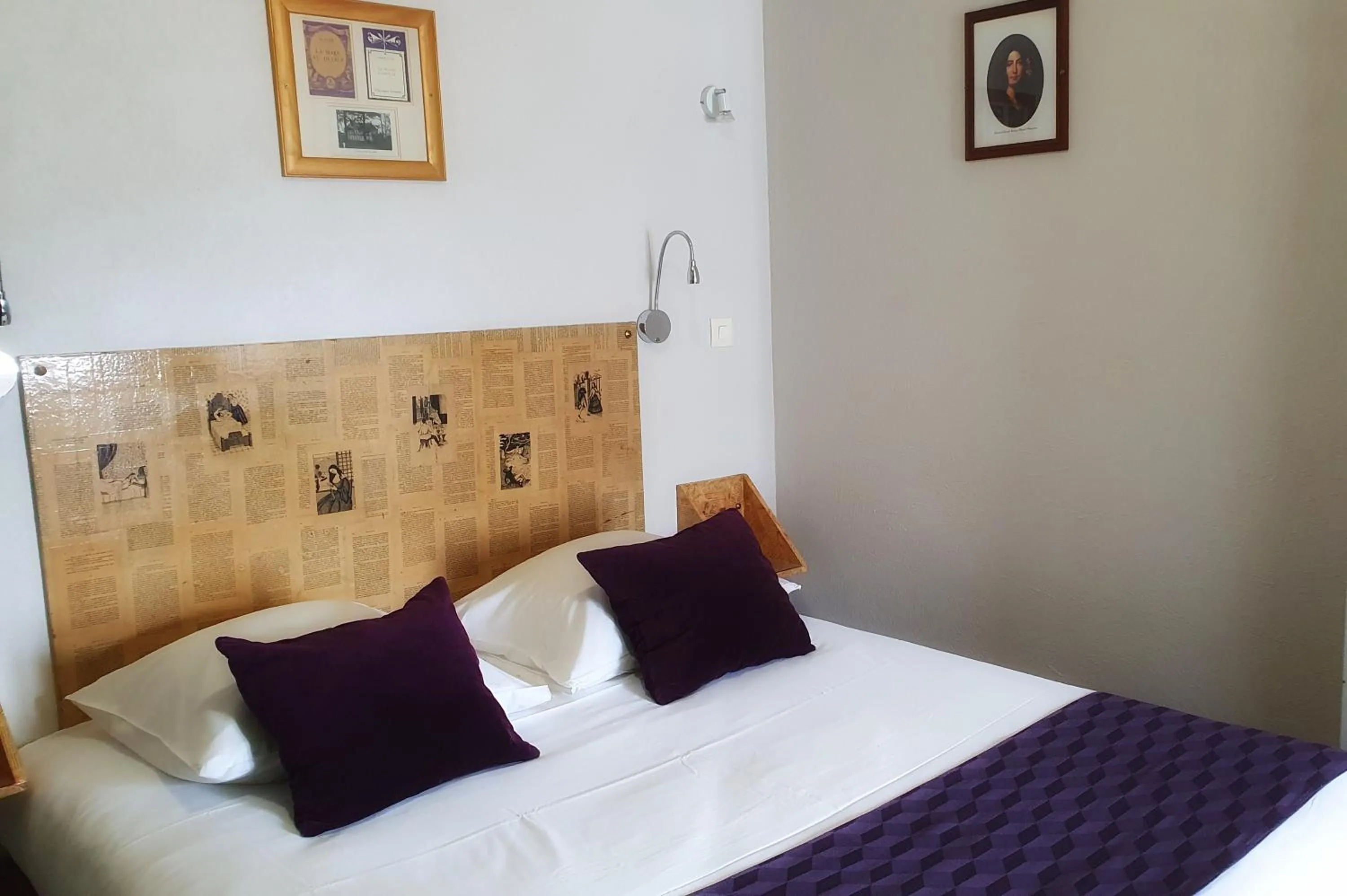 Bed in Hôtel Mille et une Feuilles