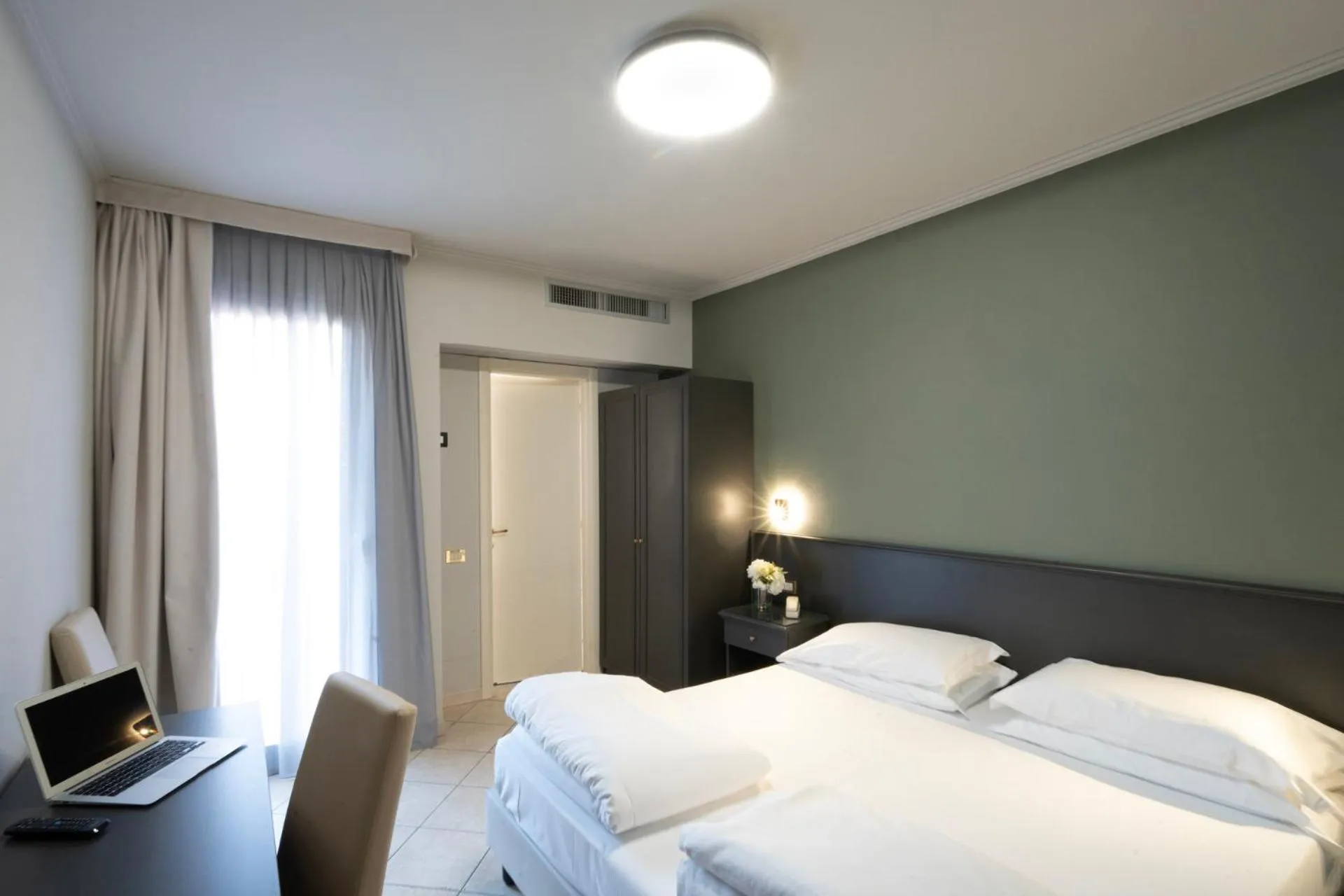 Photo of the whole room, Bed in Cavour 30TRE - Hotel Moderno