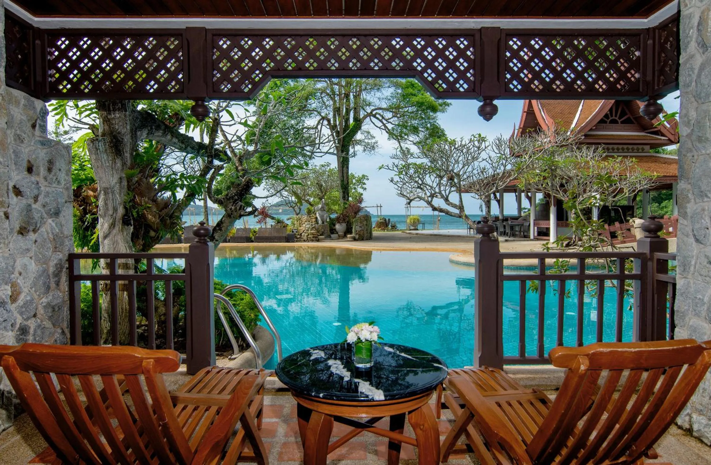 Pool view in Thavorn Beach Village Resort & Spa Phuket