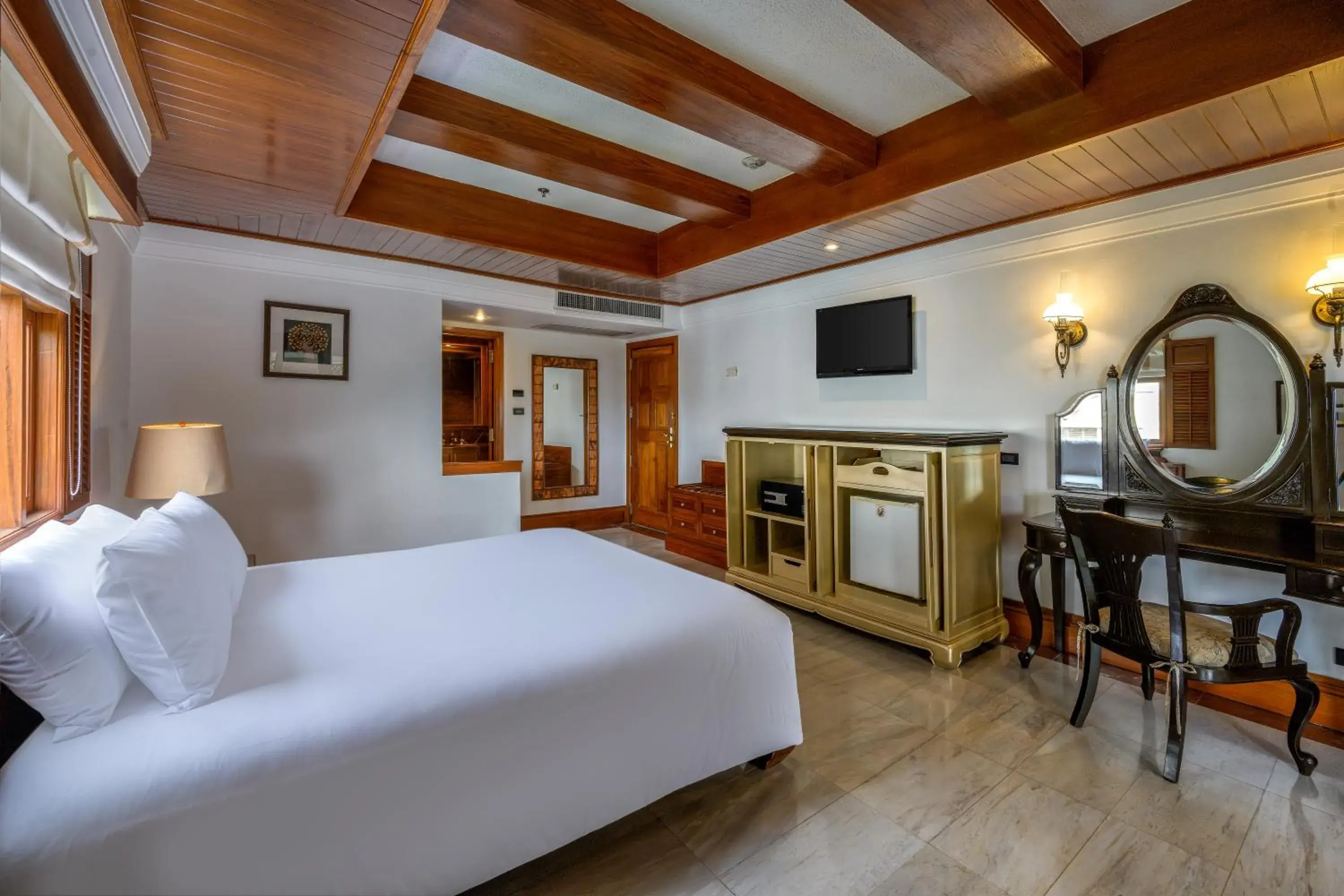 Bed in Thavorn Beach Village Resort & Spa Phuket Bed in Thavorn Beach Village Resort & Spa Phuket