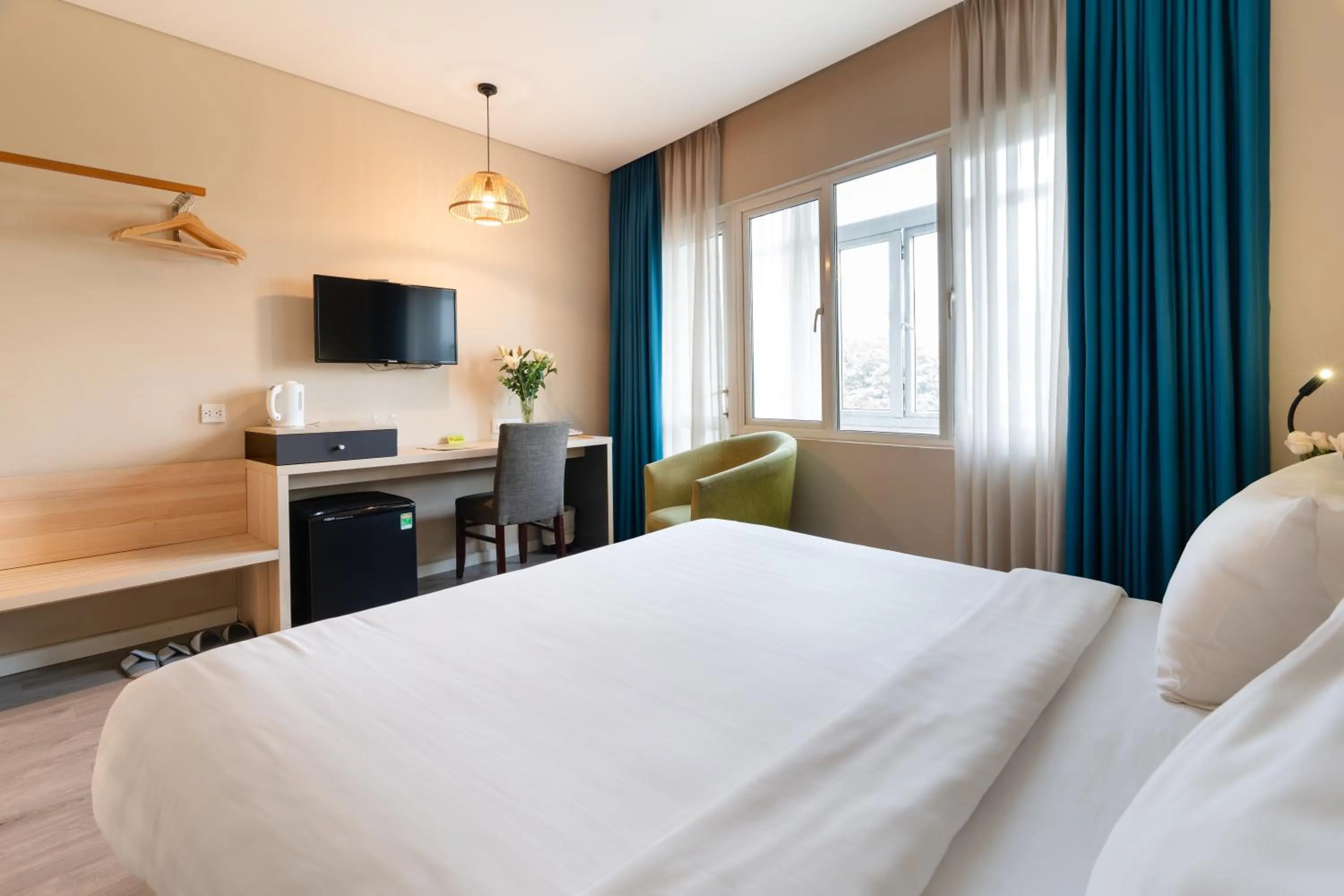 Bed in Liberty Hotel Saigon Greenview