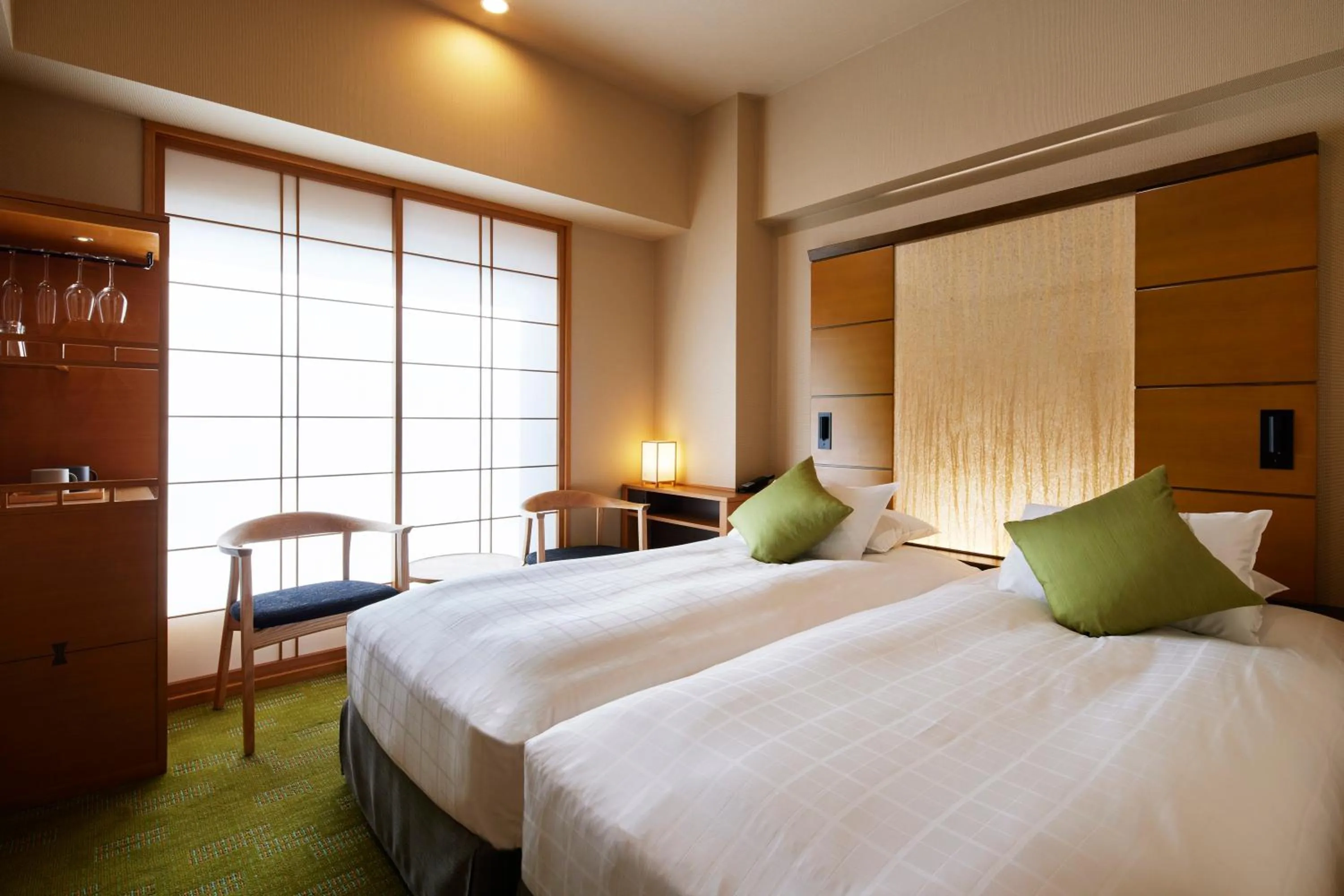 Bed in Hotel Niwa Tokyo