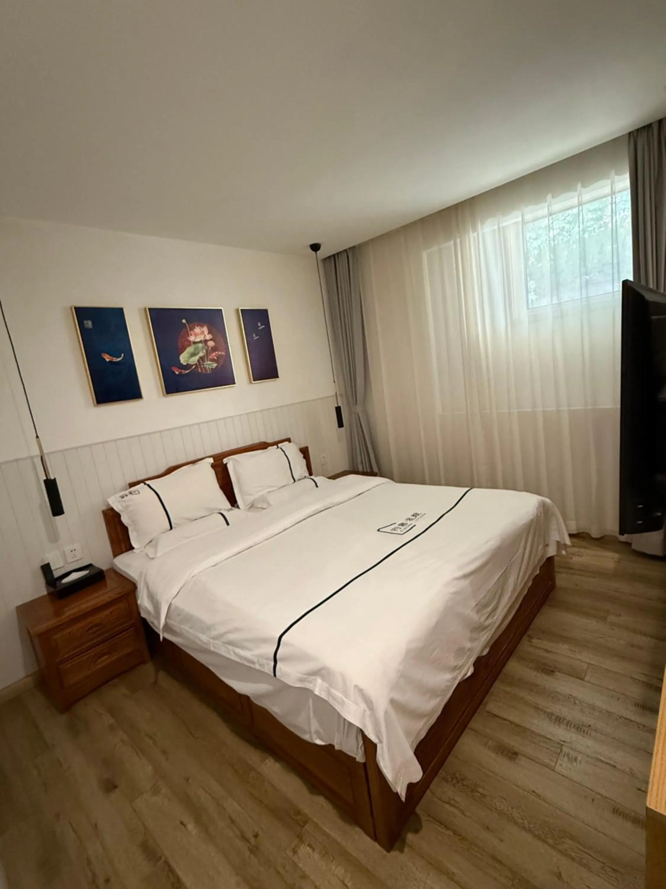 Bedroom, Bed in Xingshe Alley Courtyard Hotel Beijing Wangfujing Forbidden City