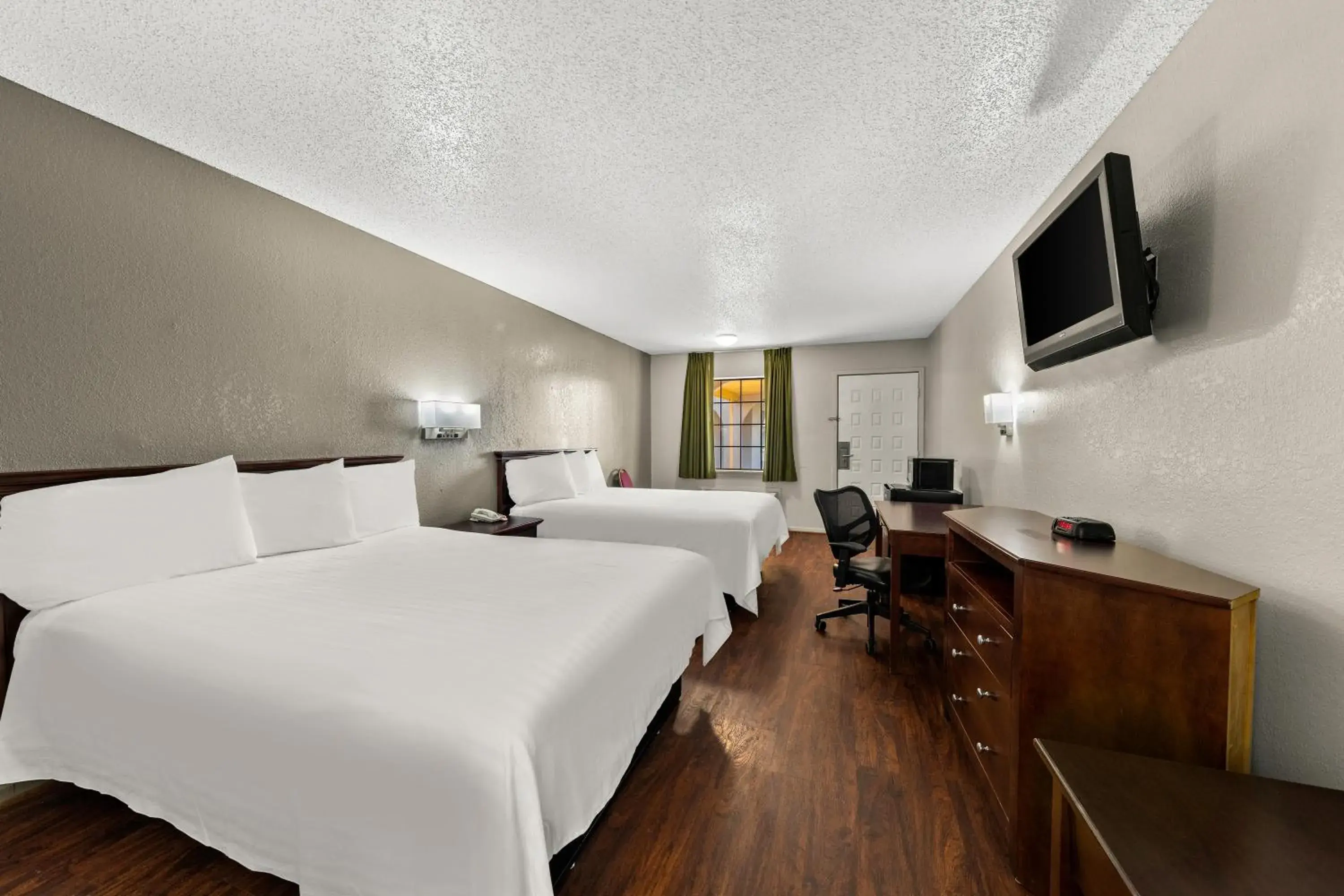 Bed in Americas Best Value Inn Bonham Bed in Americas Best Value Inn Bonham