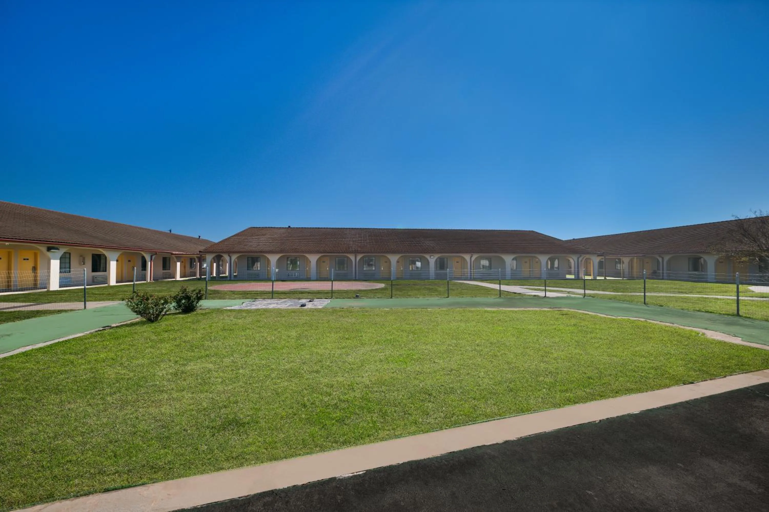 Property building in Americas Best Value Inn Bonham