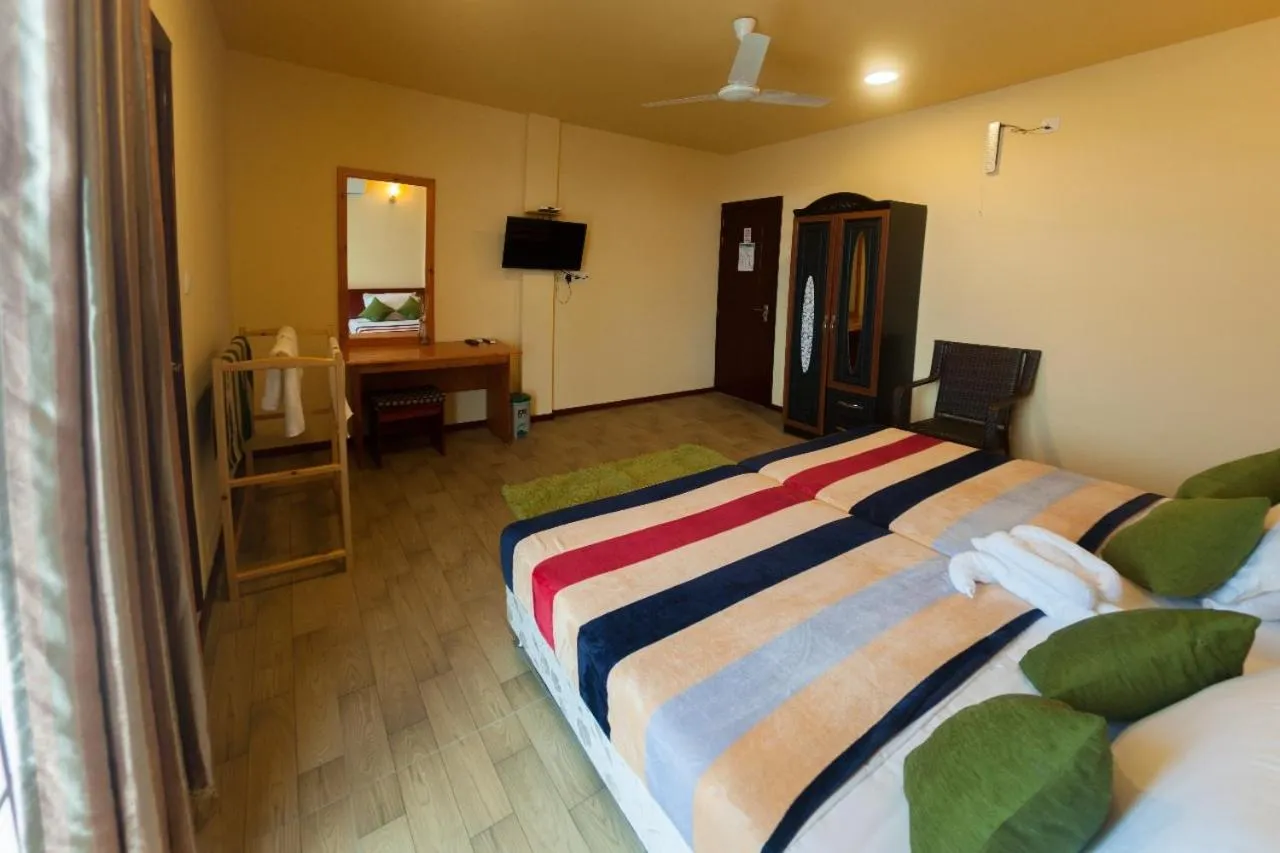 Bed in Annama Lodge and Dive