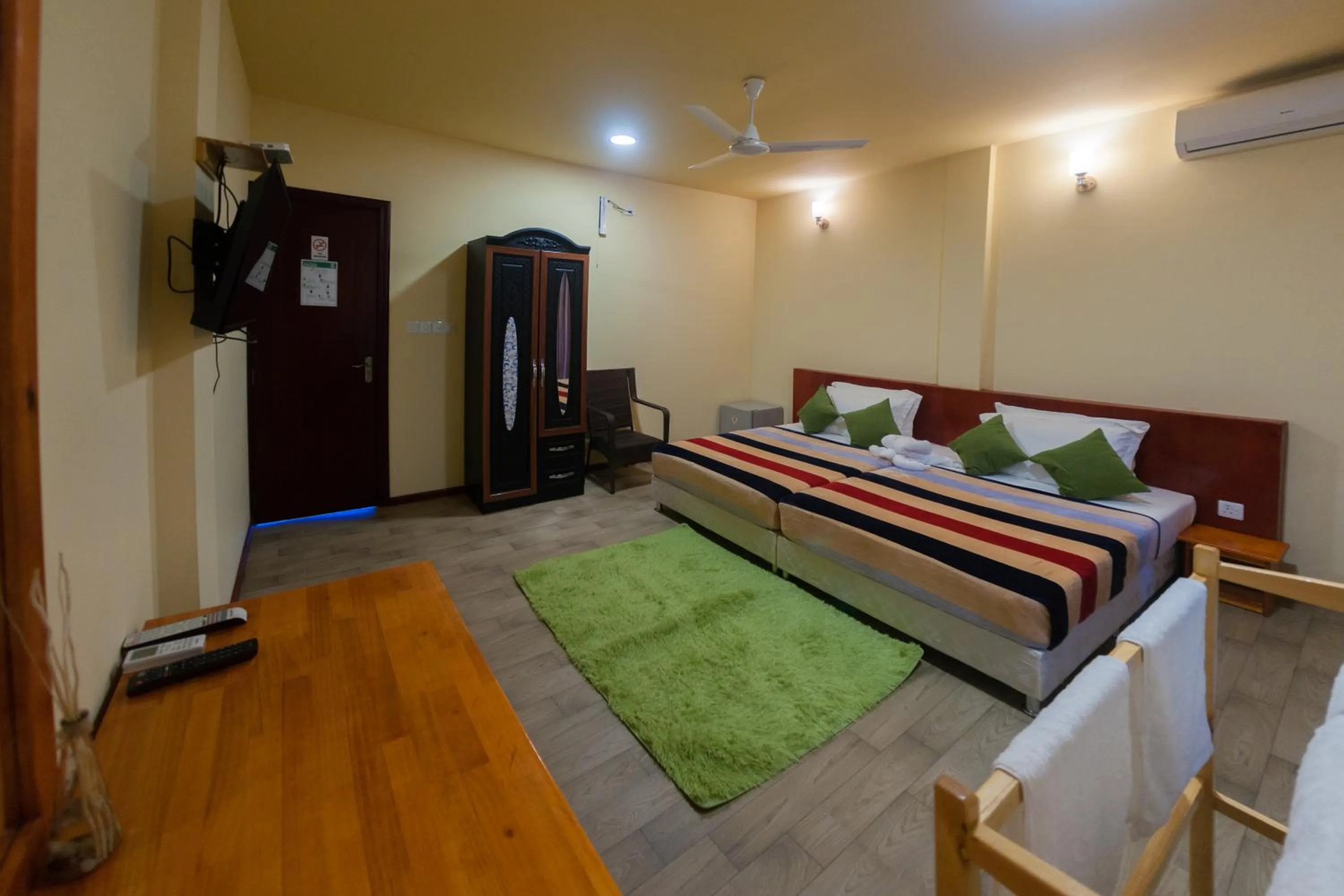 Bedroom, Bed in Annama Lodge and Dive