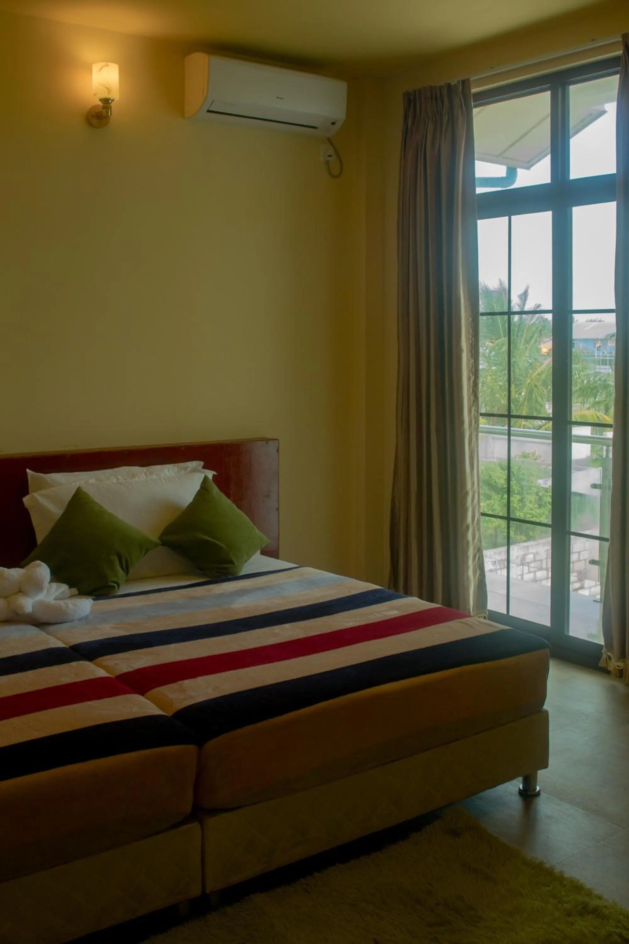 Bed in Annama Lodge and Dive