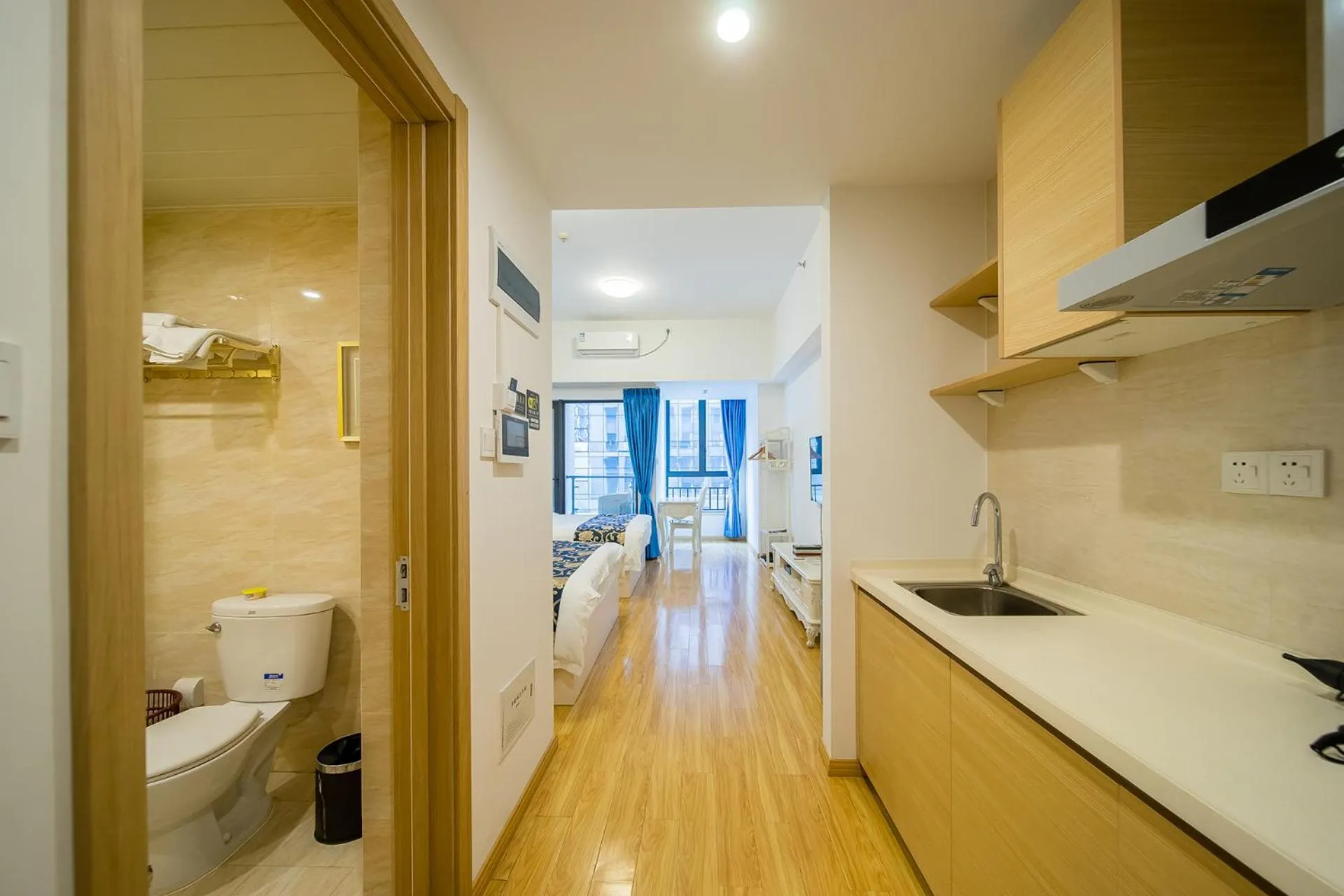 Kitchen or kitchenette in Guangzhou Laiste ApartHotel Science City Greenland Central Plaza Branch - Free Shuttle Bus to Canton Fair Complex During Canton Fair Period