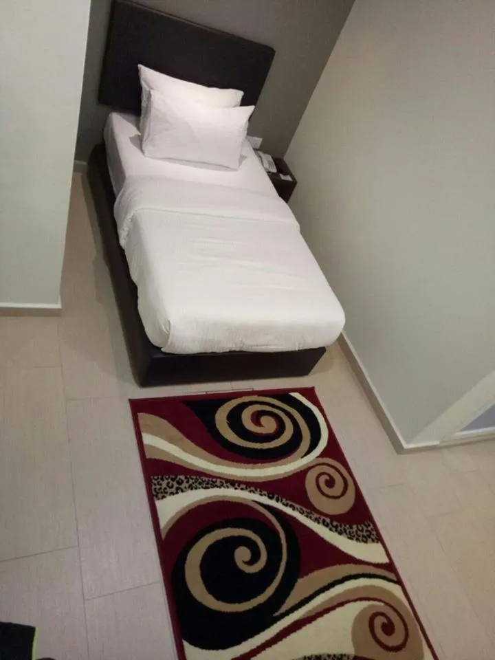 Bed in Be Boutique Hotel