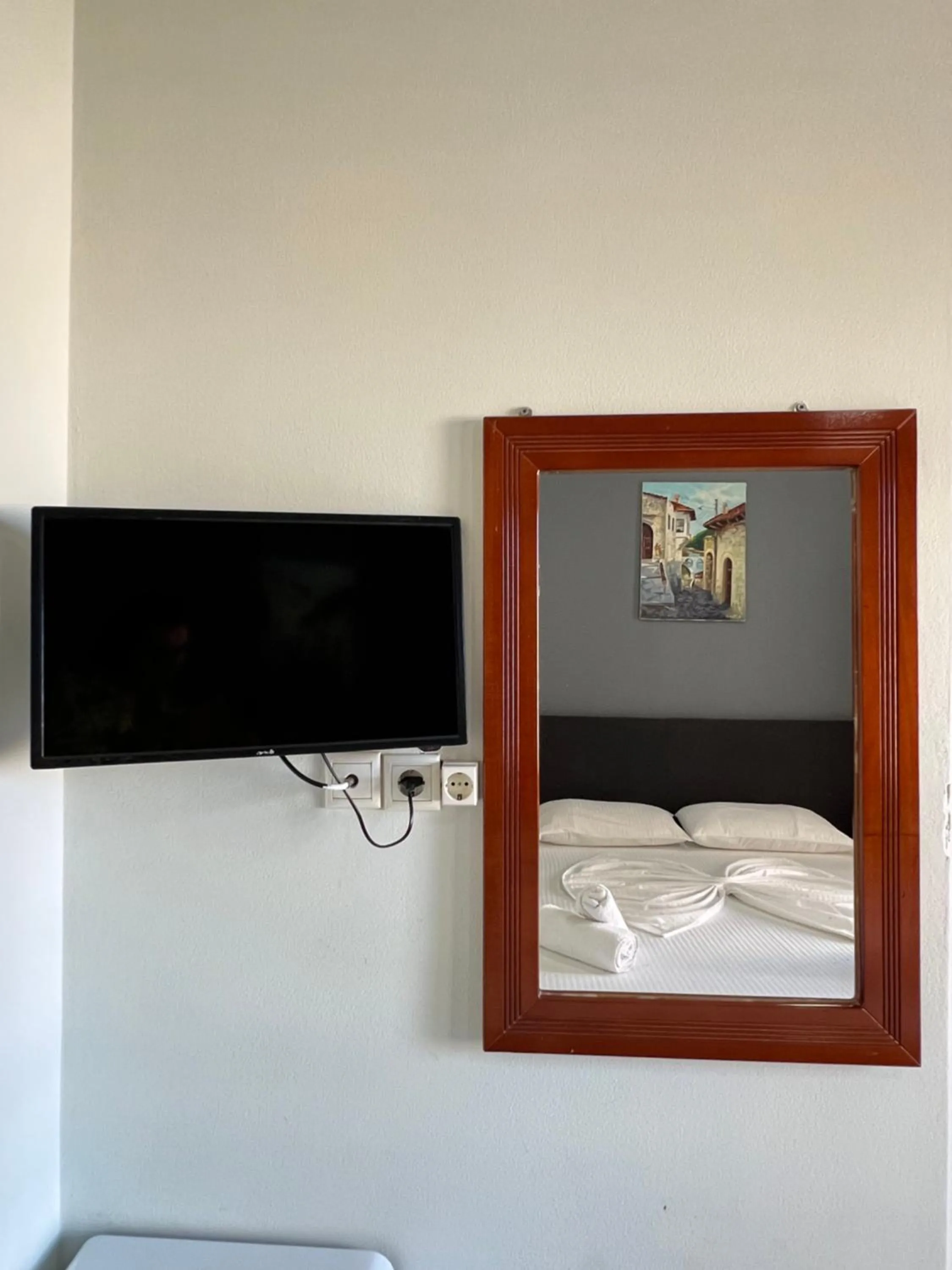Bed in Privé City Hotel