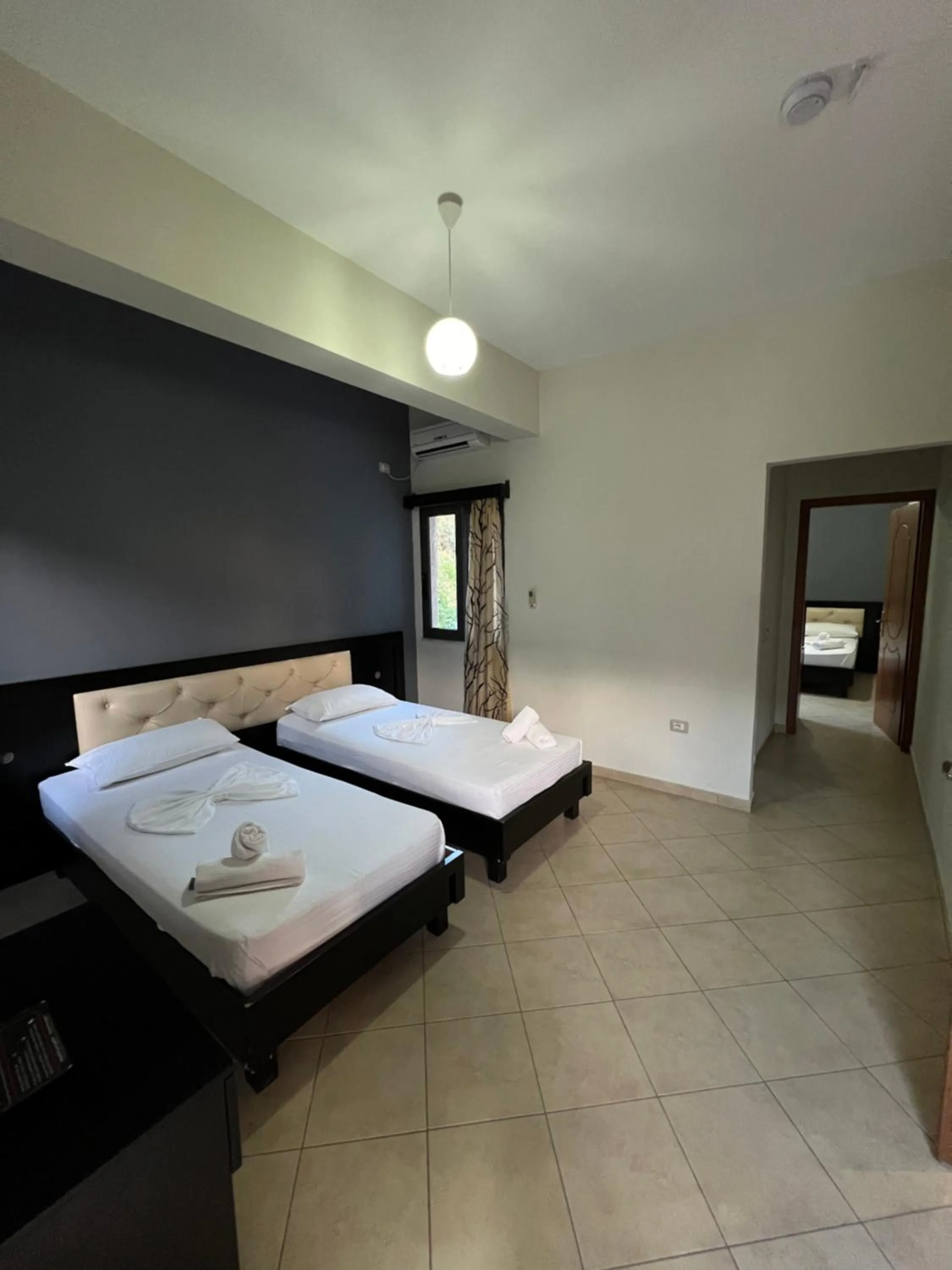 Bed in Privé City Hotel