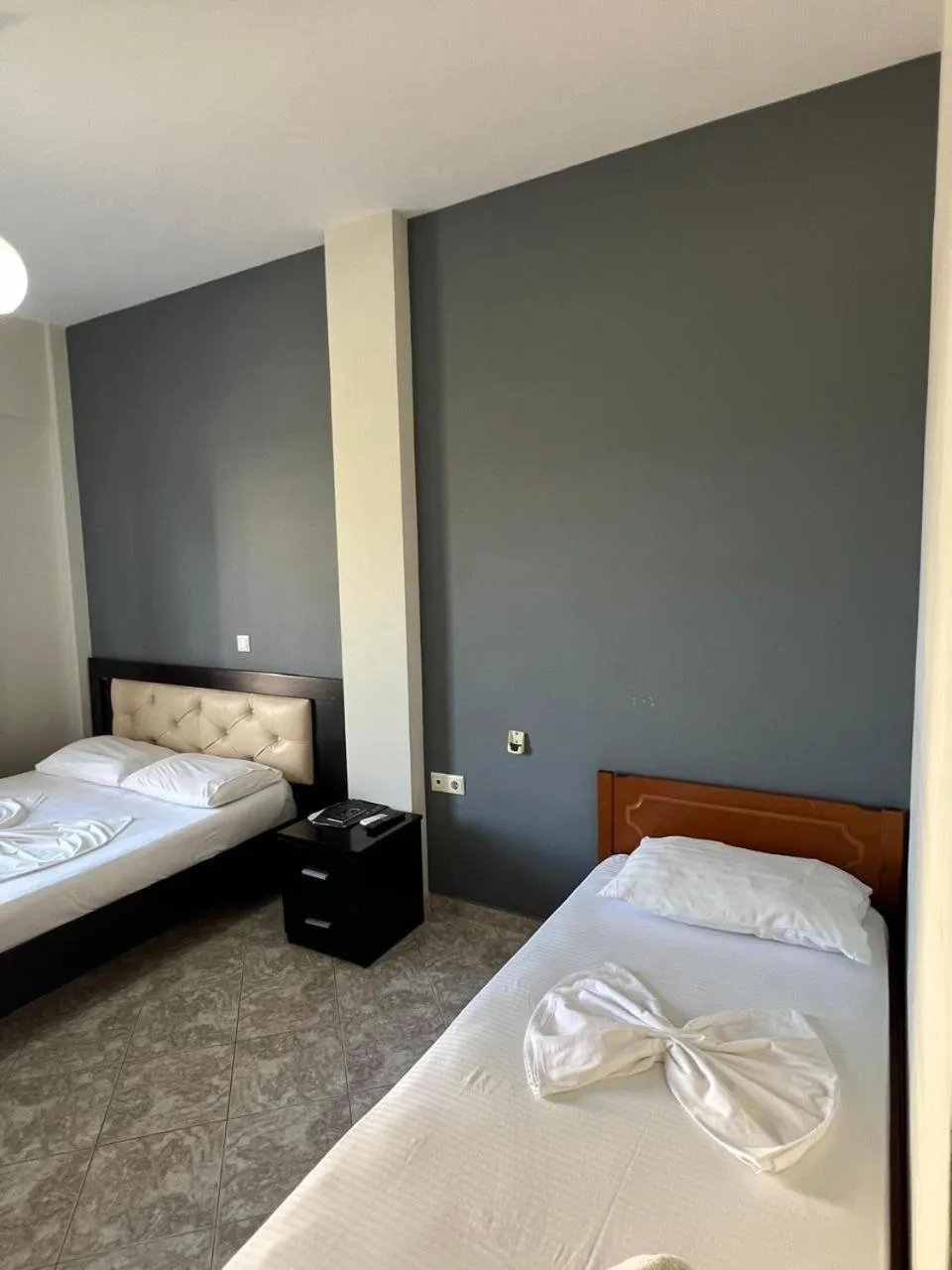 Bed in Privé City Hotel