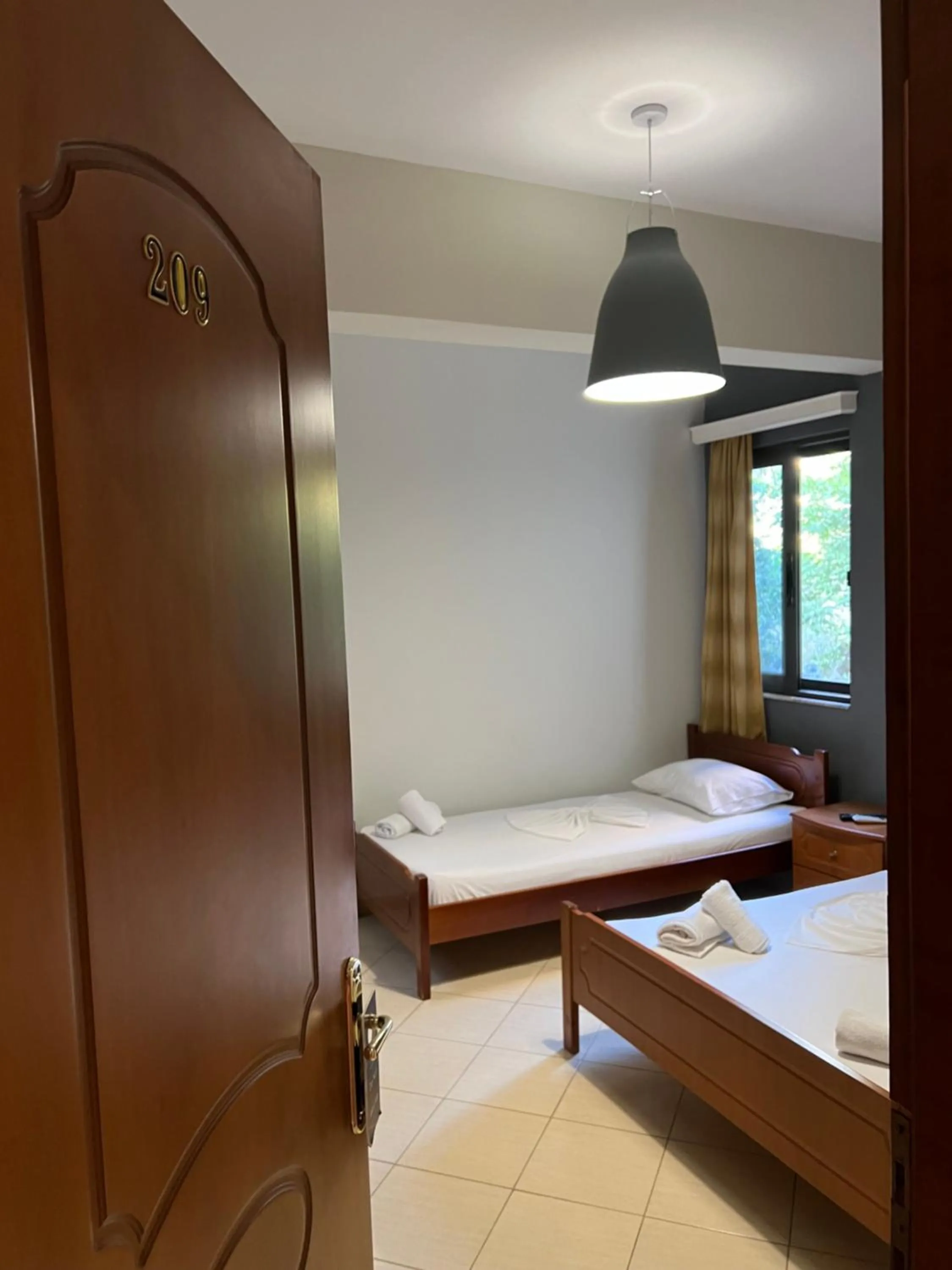 Bed in Privé City Hotel