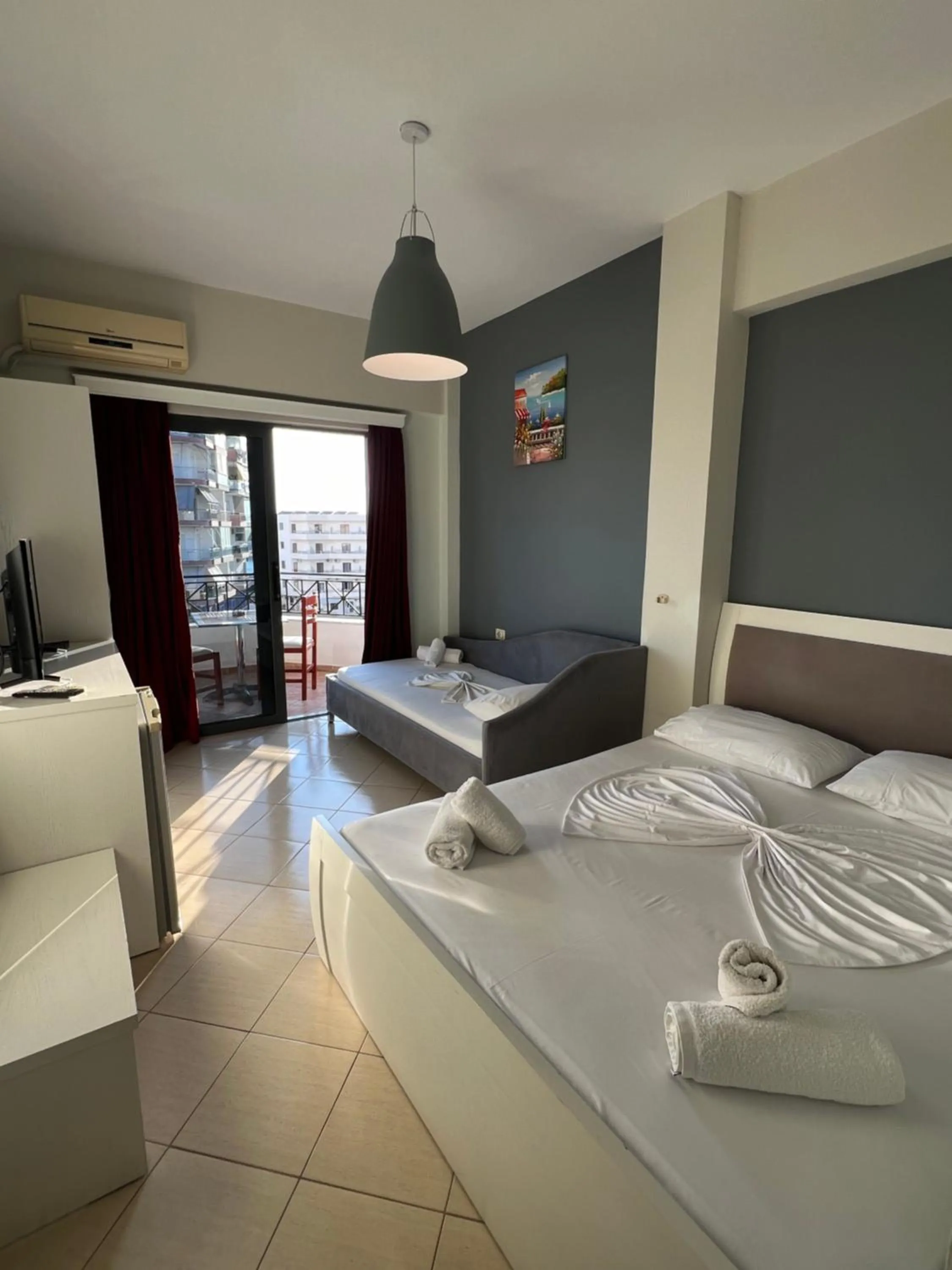 Bed in Privé City Hotel
