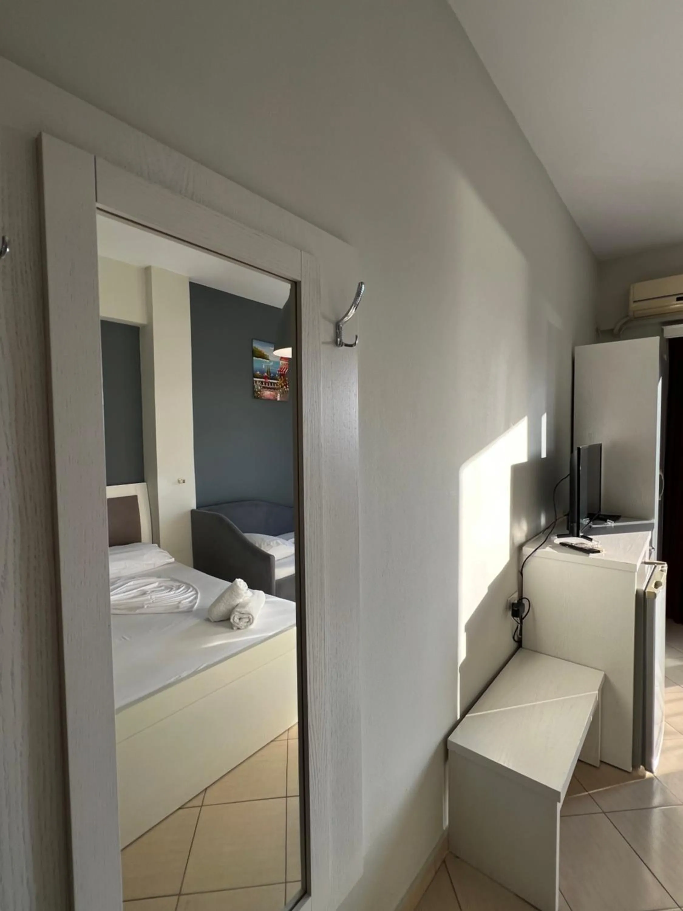 Bed in Privé City Hotel
