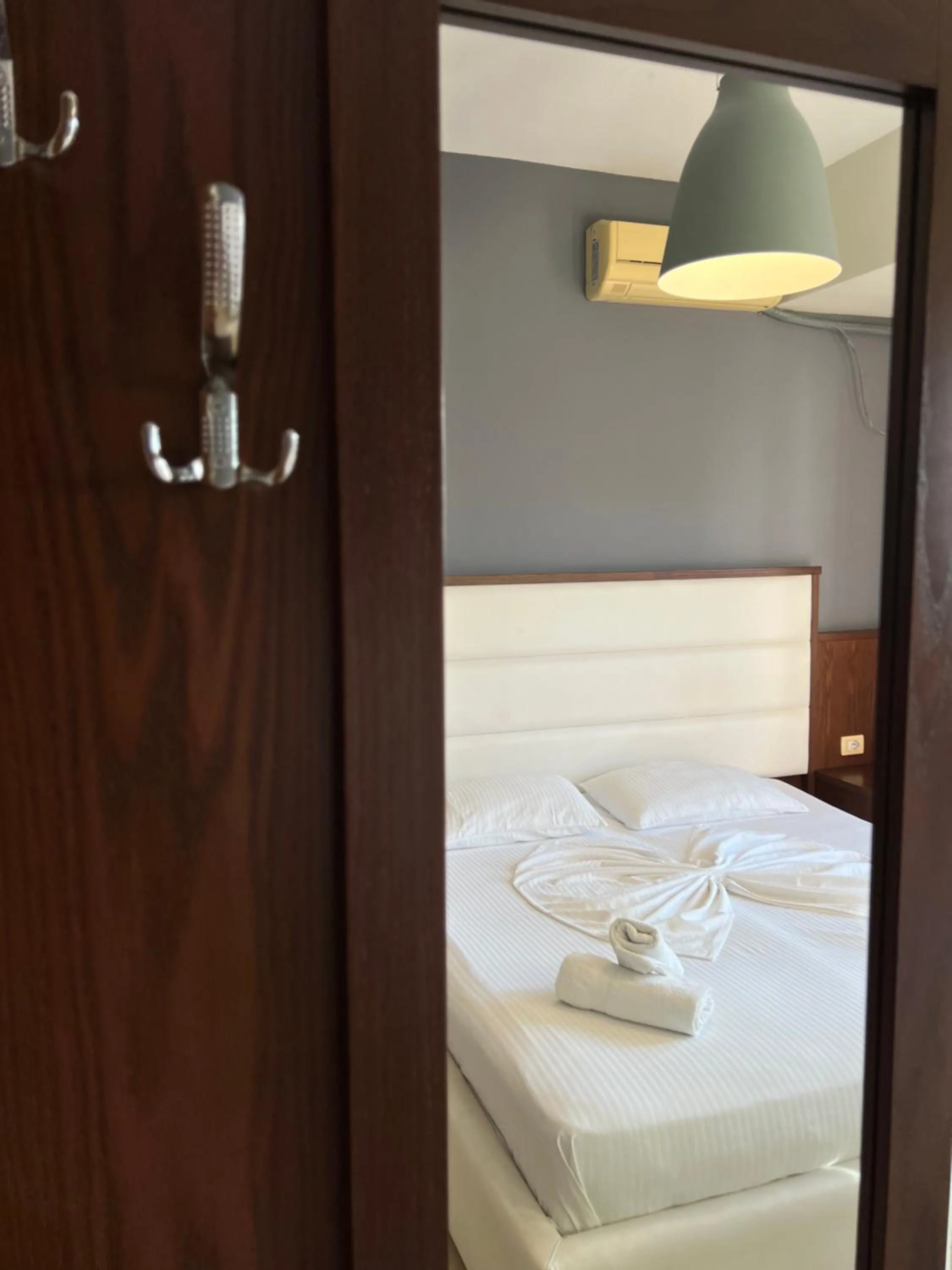 Bed in Privé City Hotel