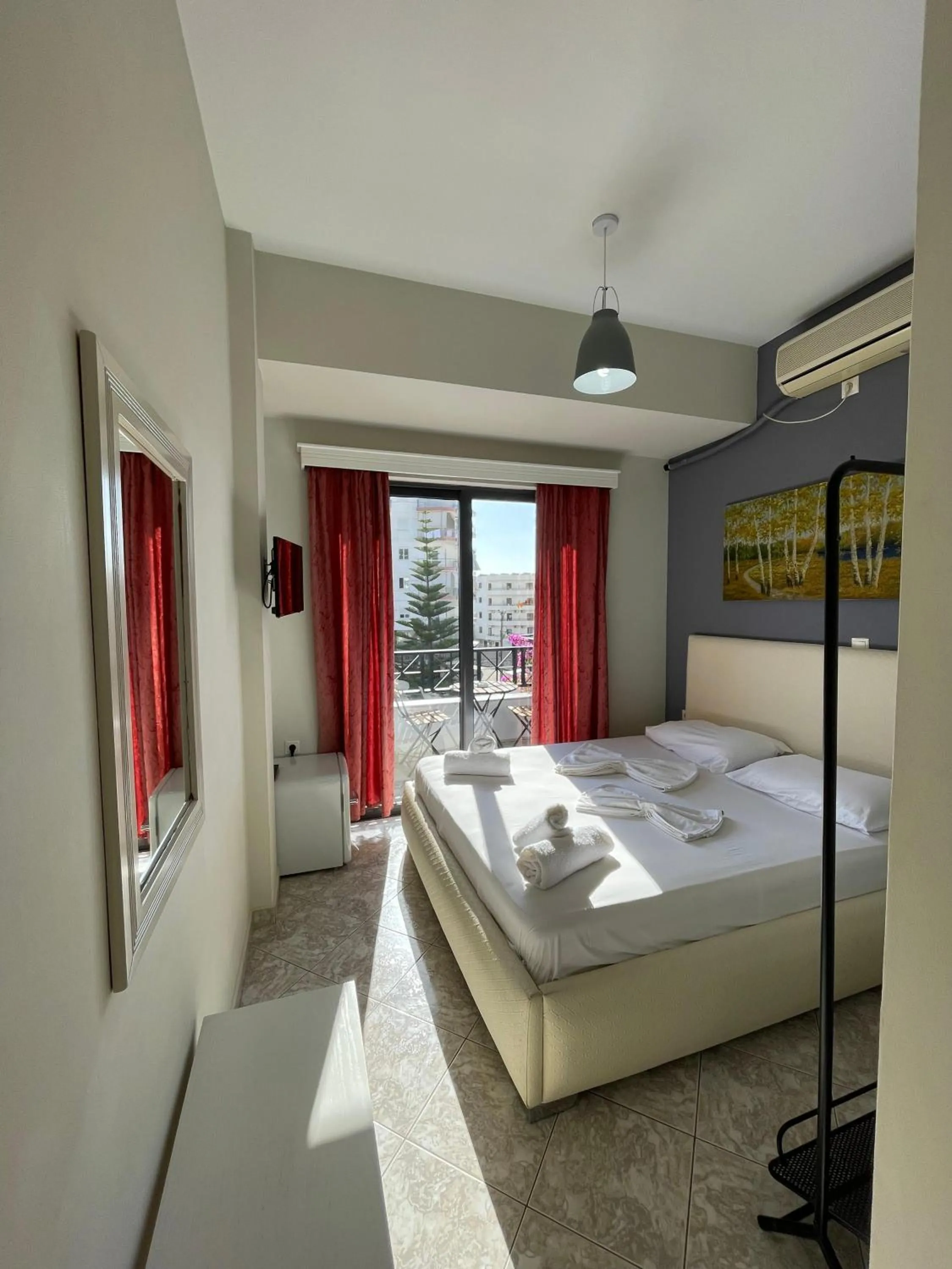 Bed in Privé City Hotel
