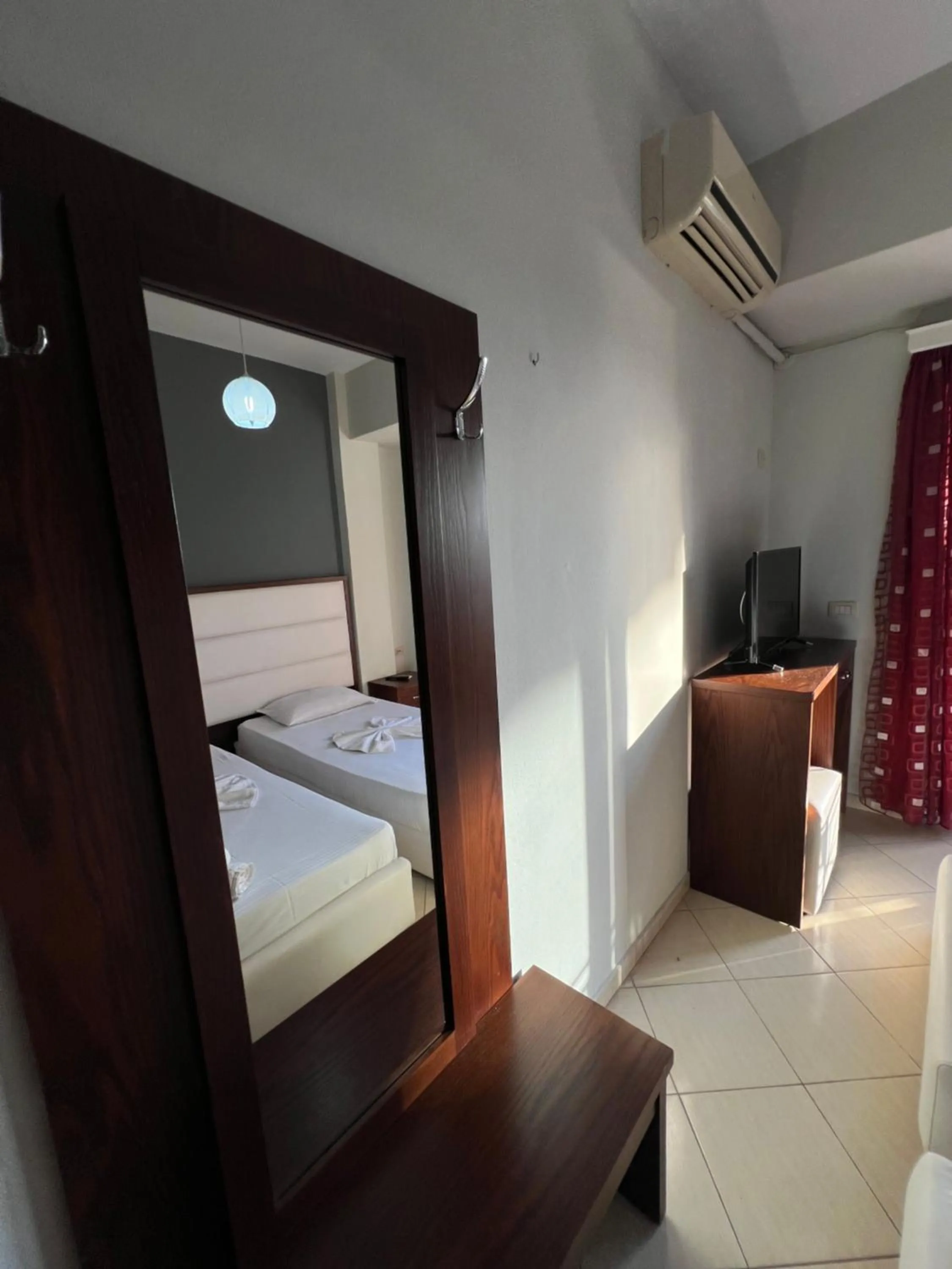 Bed in Privé City Hotel