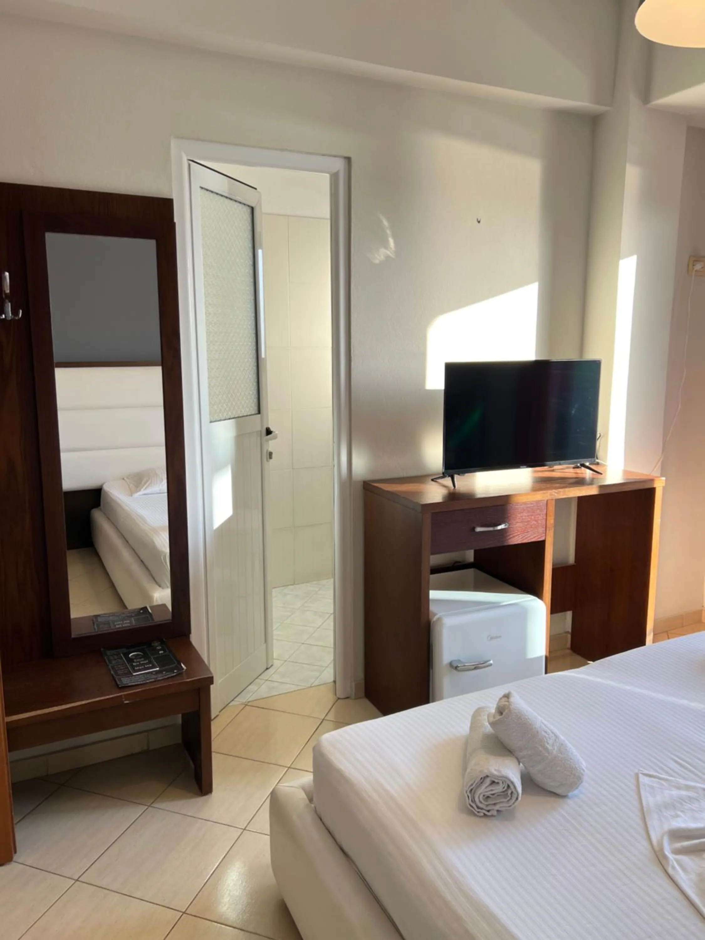 Bed in Privé City Hotel
