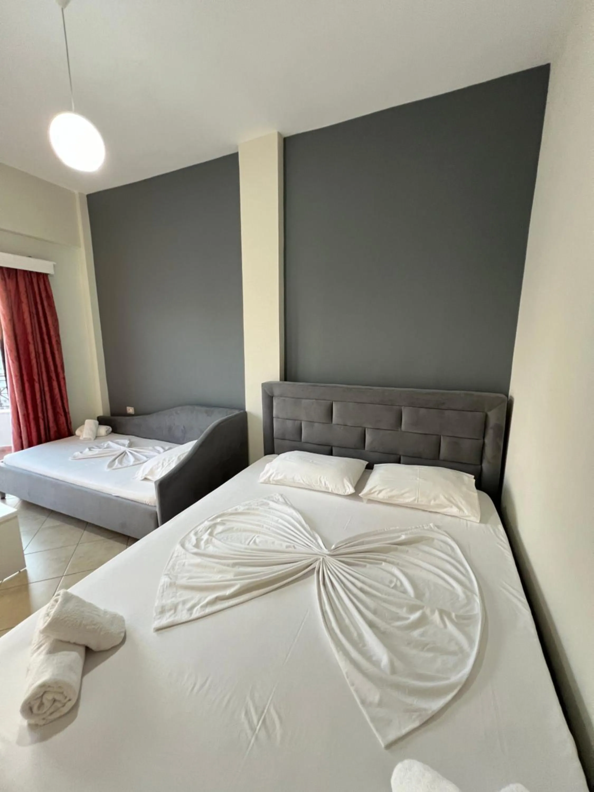 Bed in Privé City Hotel